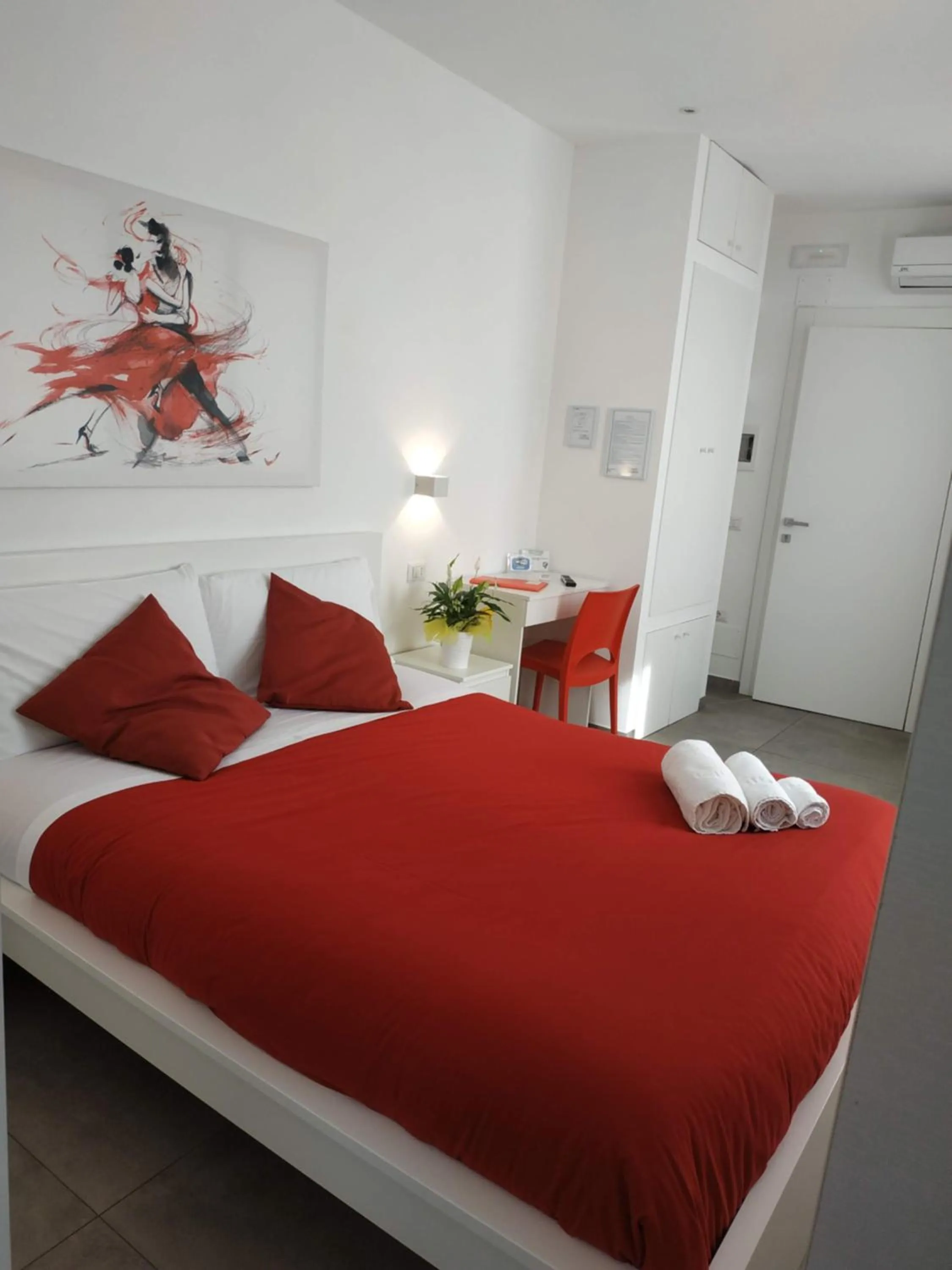 Bed in Palazzo Verdi Holiday Viterbo