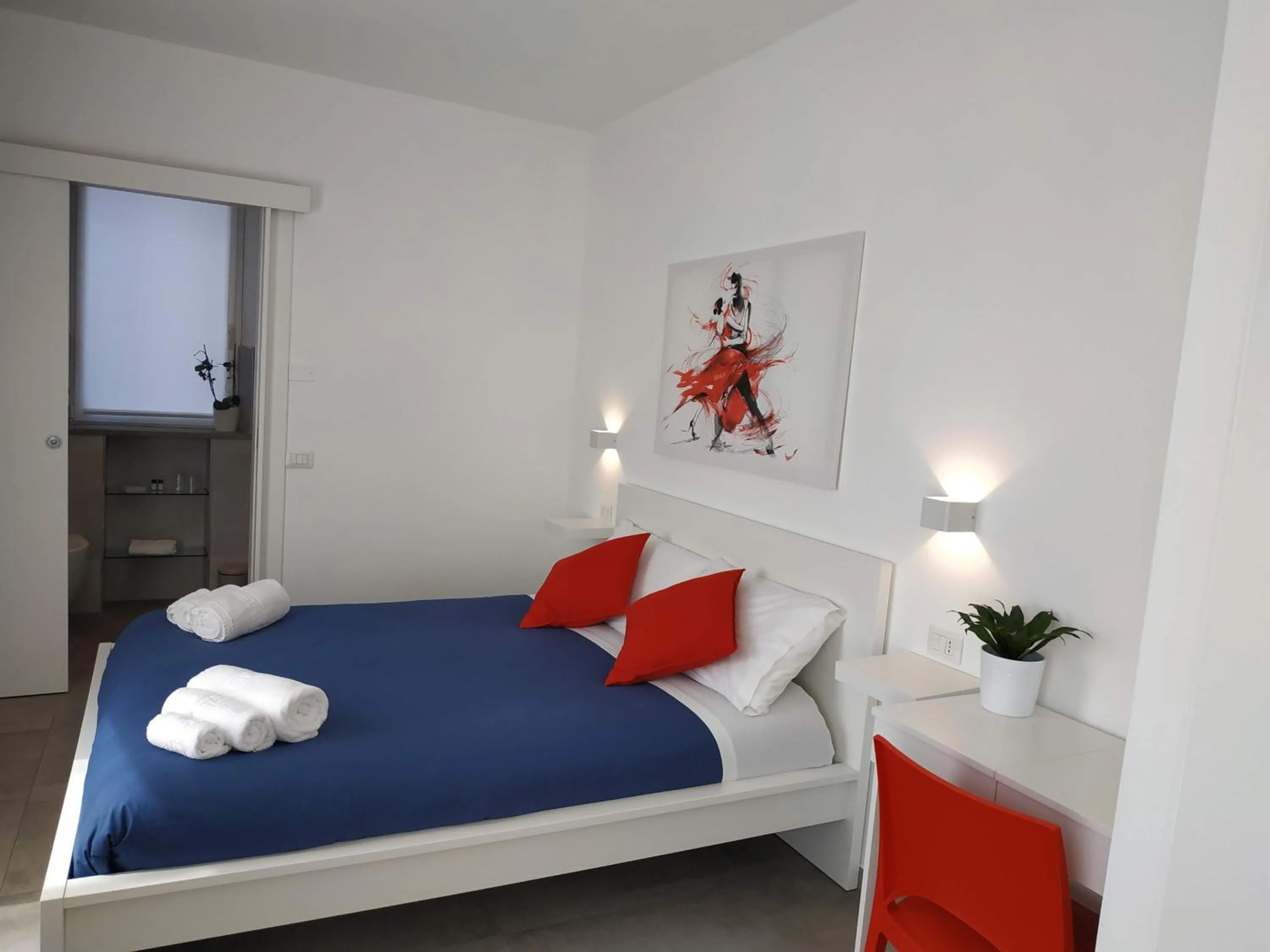 Bed in Palazzo Verdi Holiday Viterbo