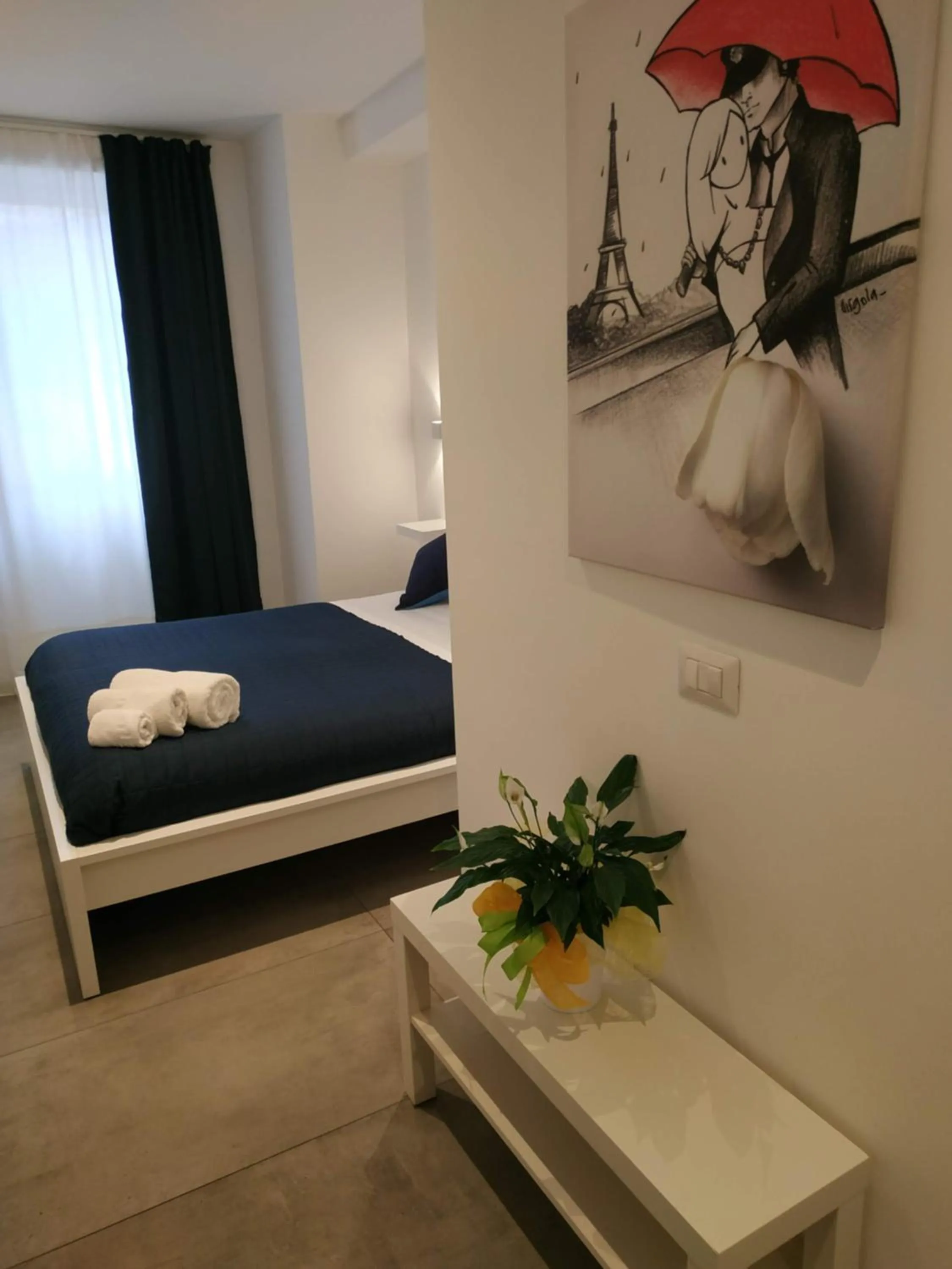 Bed in Palazzo Verdi Holiday Viterbo