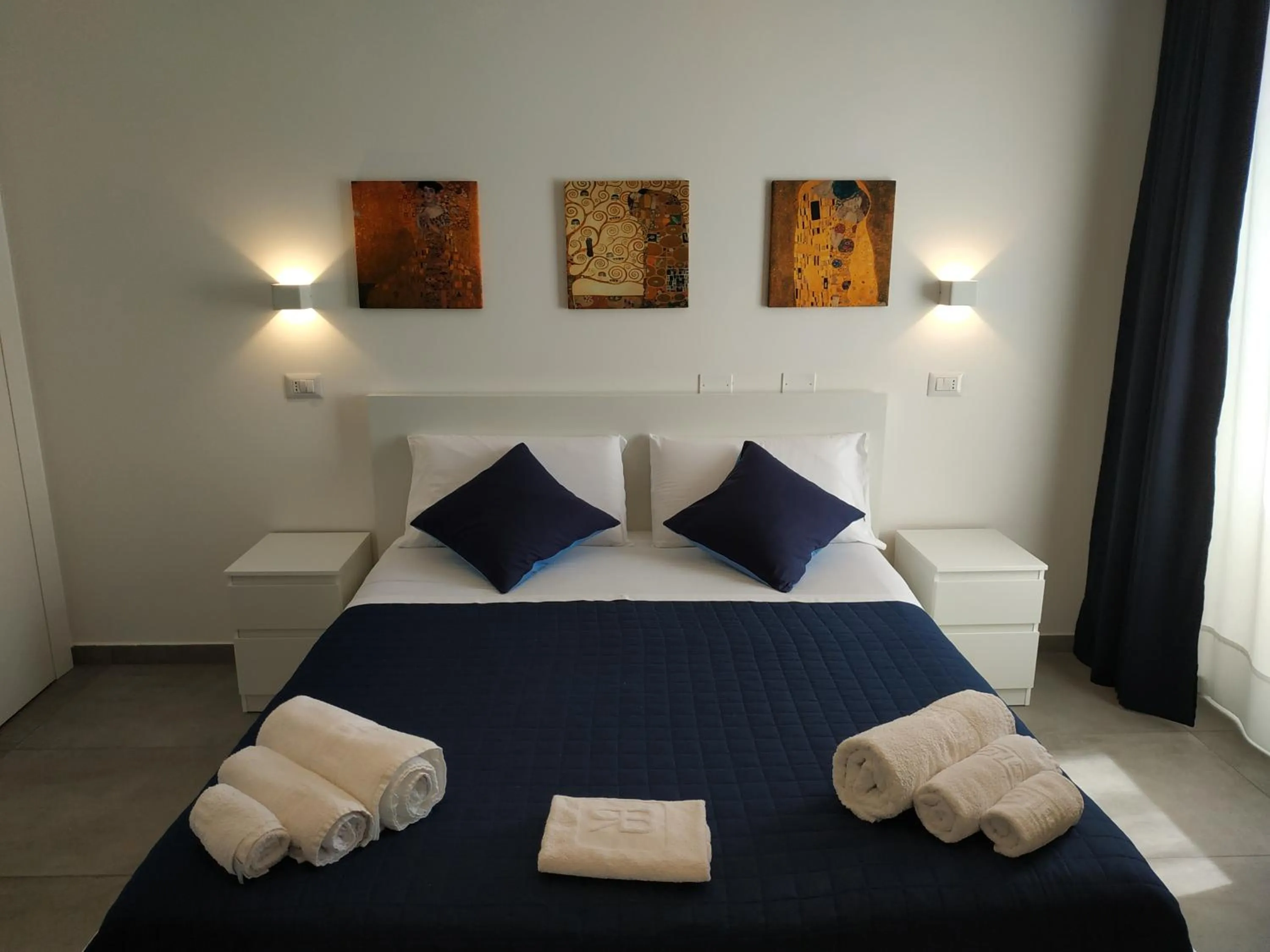 Bed in Palazzo Verdi Holiday Viterbo