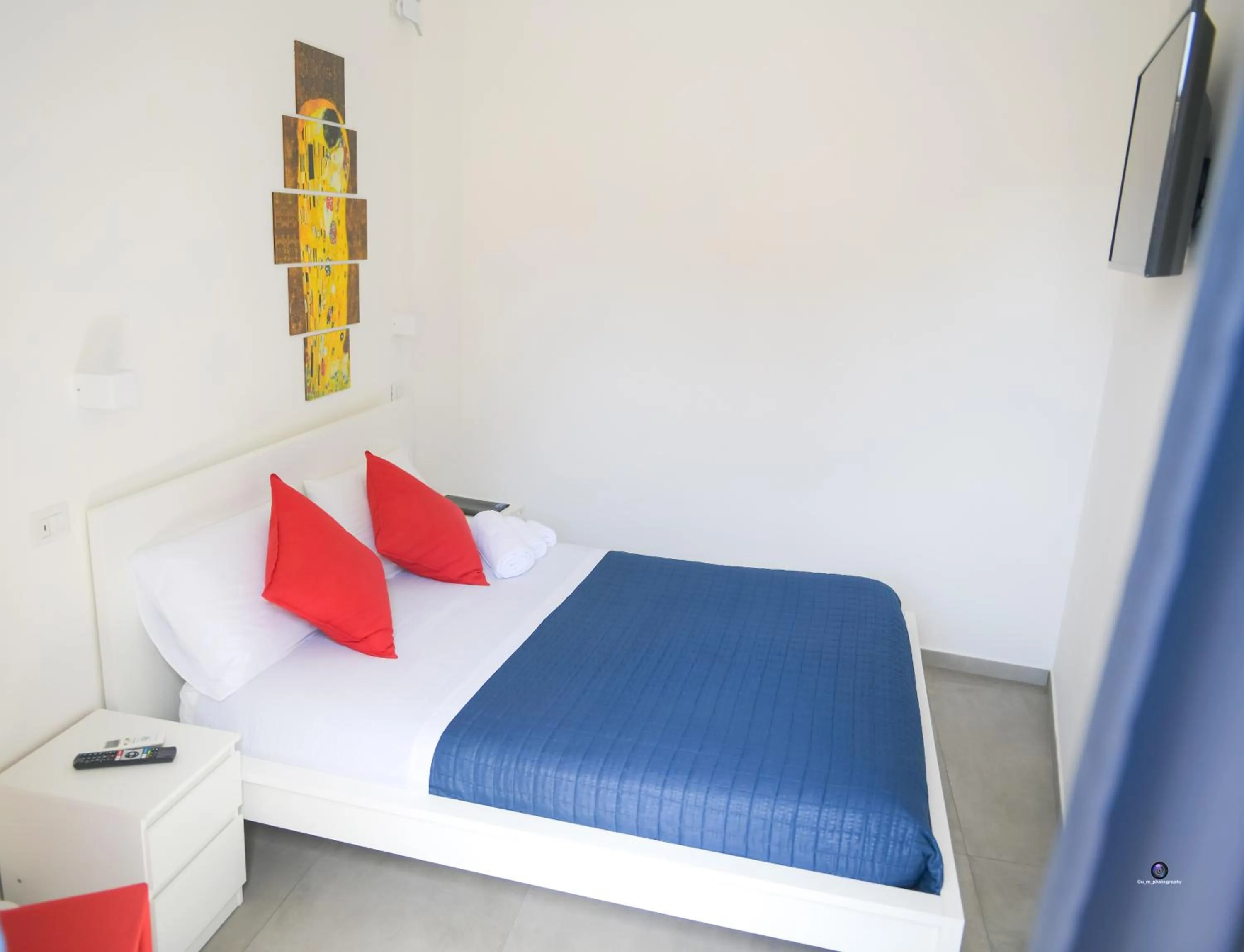 Bed in Palazzo Verdi Holiday Viterbo