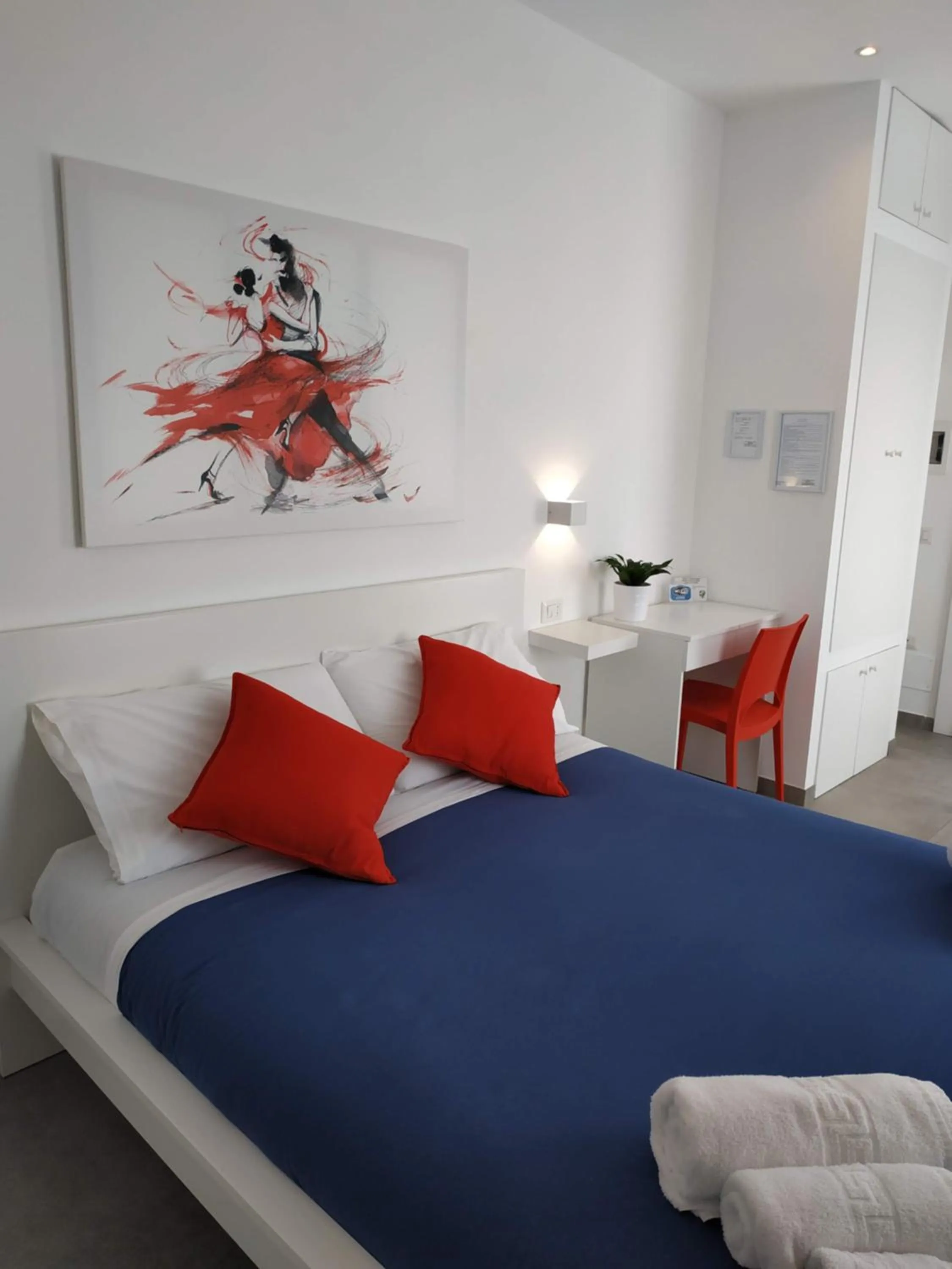 Bed in Palazzo Verdi Holiday Viterbo