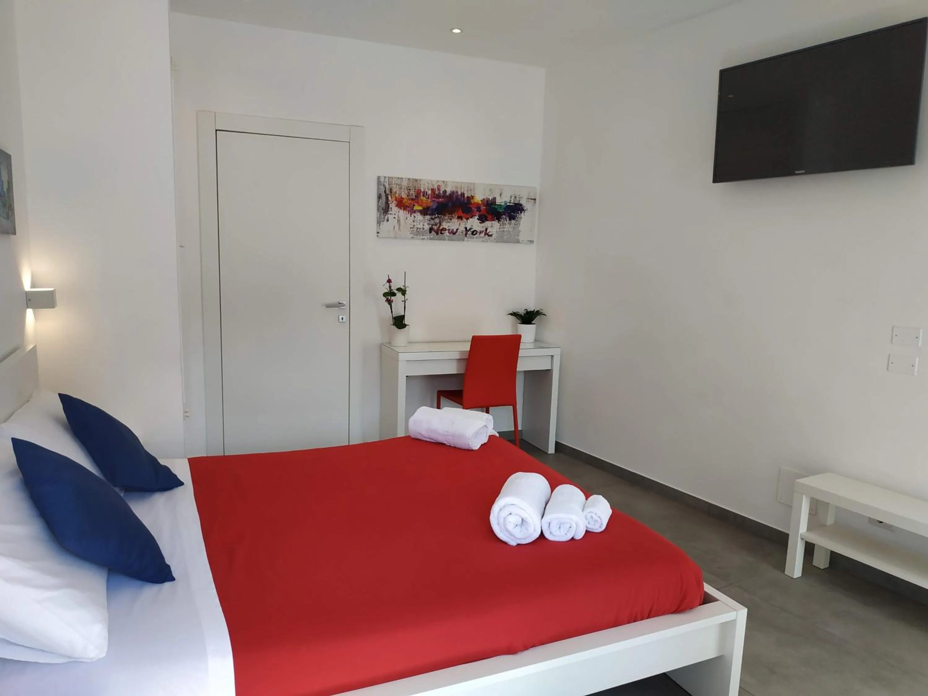 Bed in Palazzo Verdi Holiday Viterbo