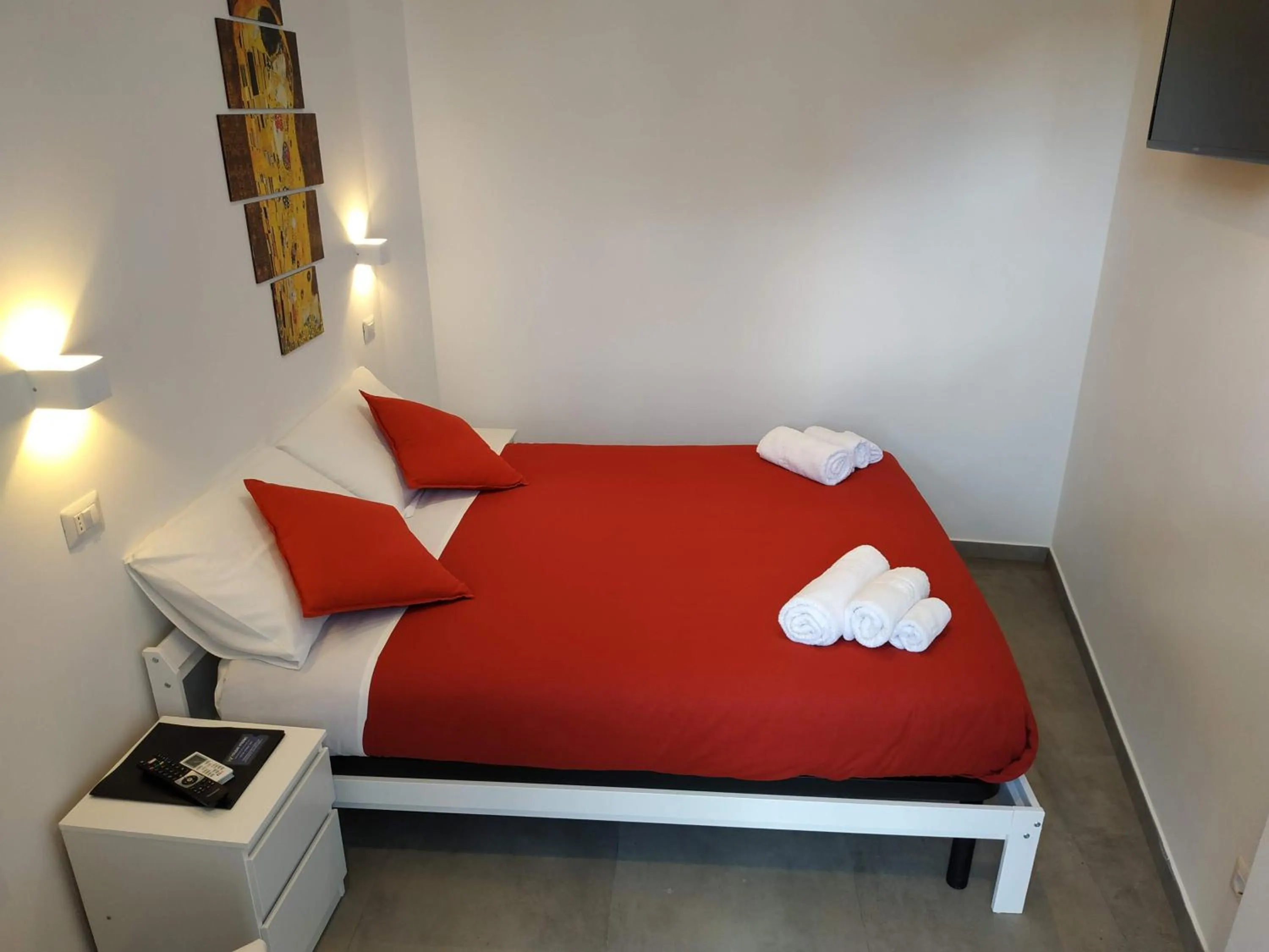 Bed in Palazzo Verdi Holiday Viterbo