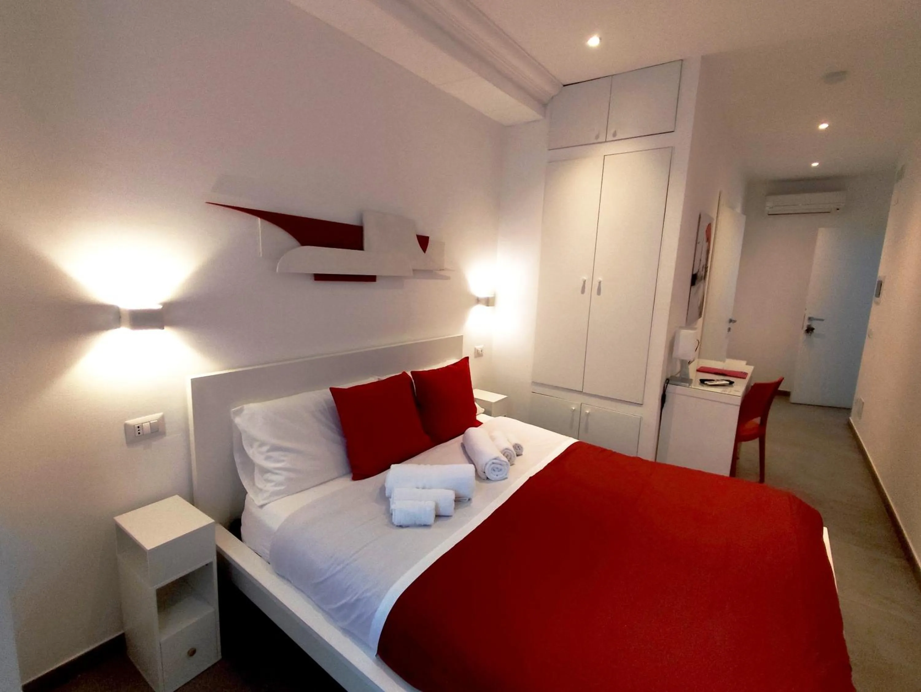 Bed in Palazzo Verdi Holiday Viterbo