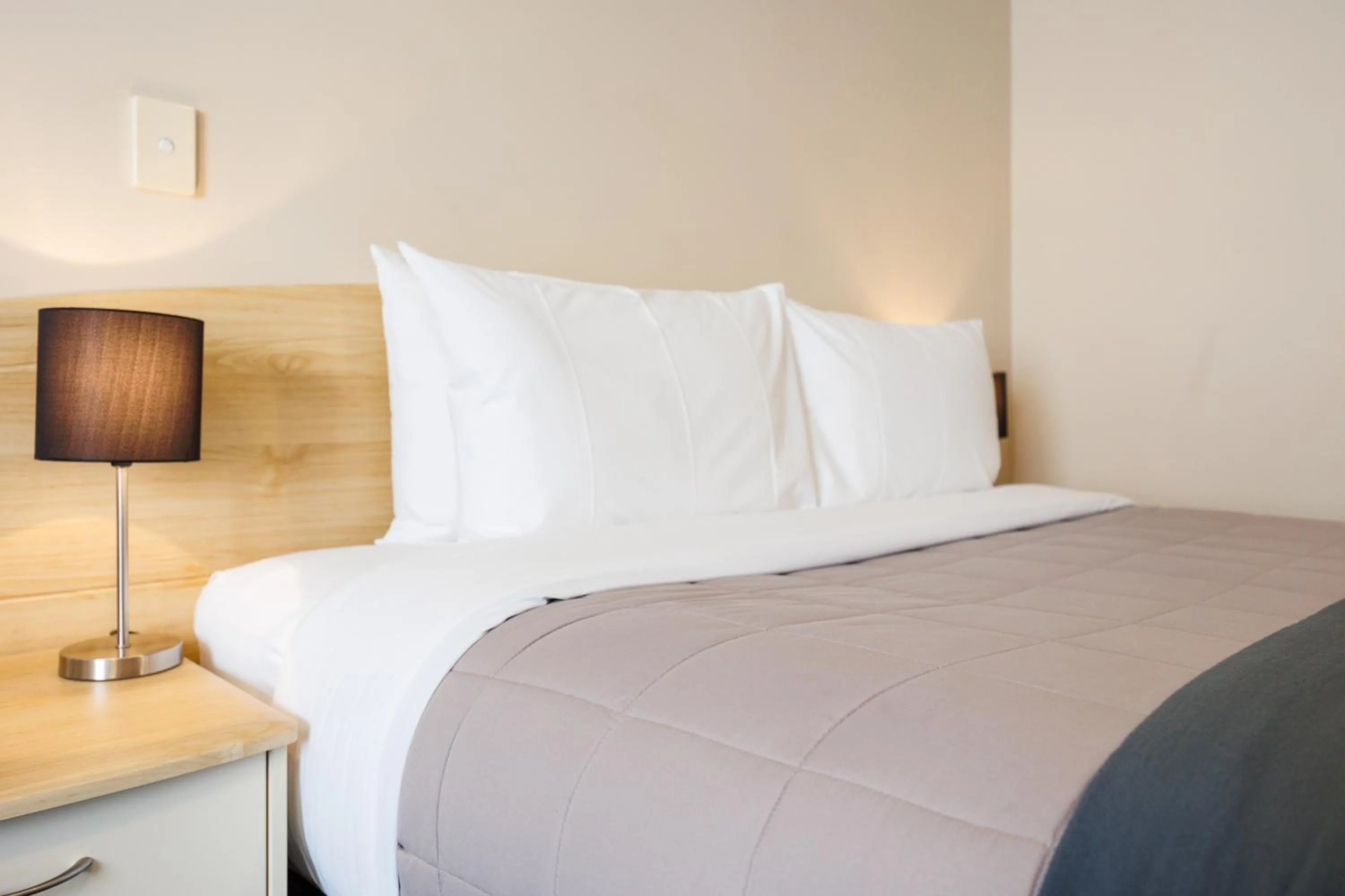 Bed in Braemar Motor Lodge