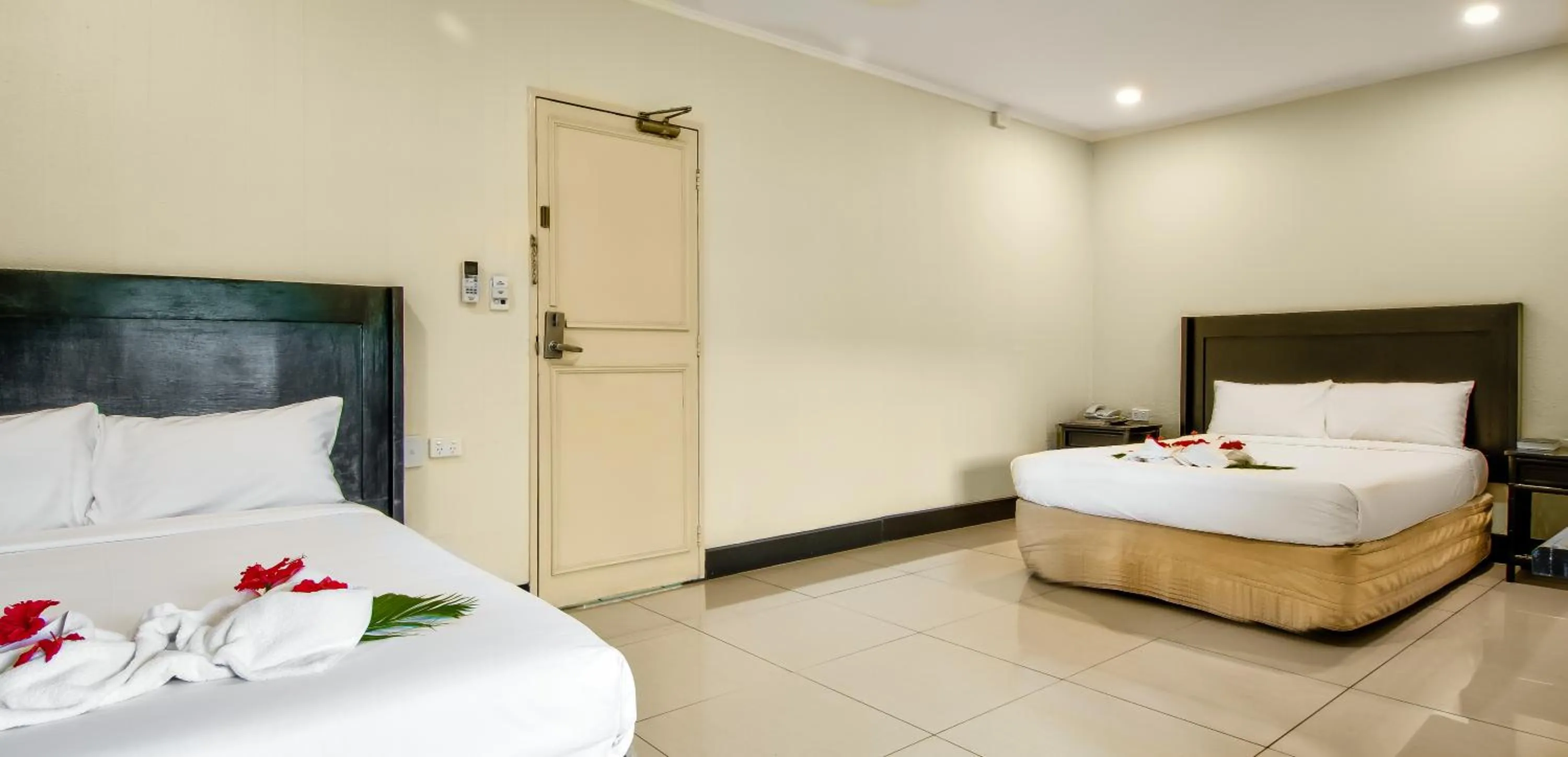 Bed in Tanoa Skylodge Hotel