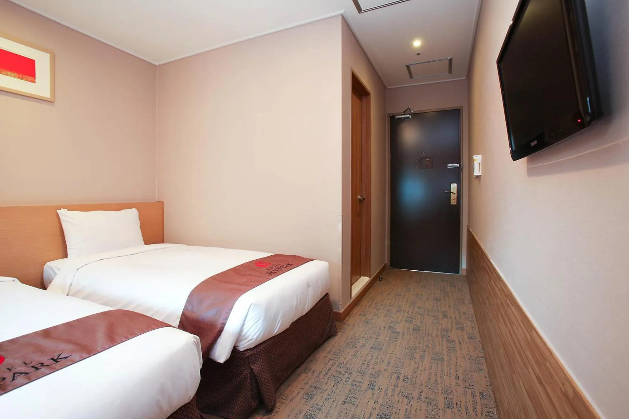 Photo of the whole room, Bed in Hotel Skypark Myeongdong 3