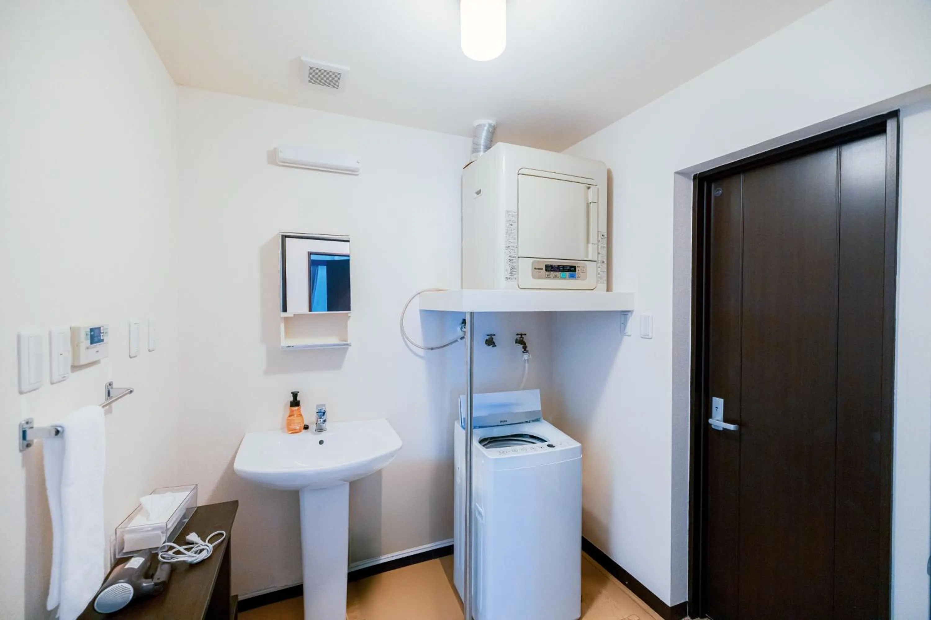 washing machine in Scallop Beach Condominium