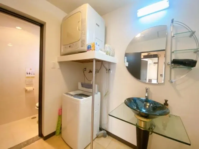 washing machine in Scallop Beach Condominium