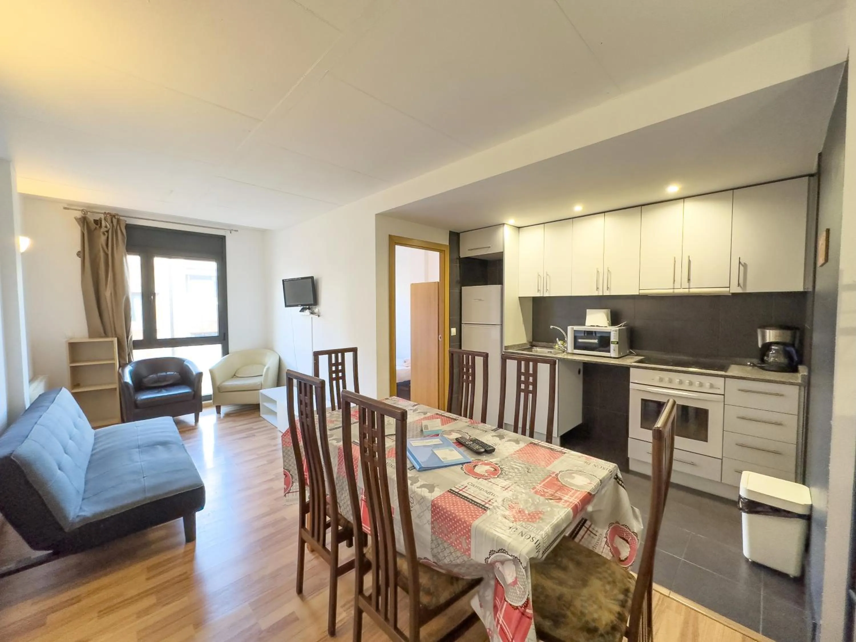 Kitchen or kitchenette in Apartamentos La Solana 3000