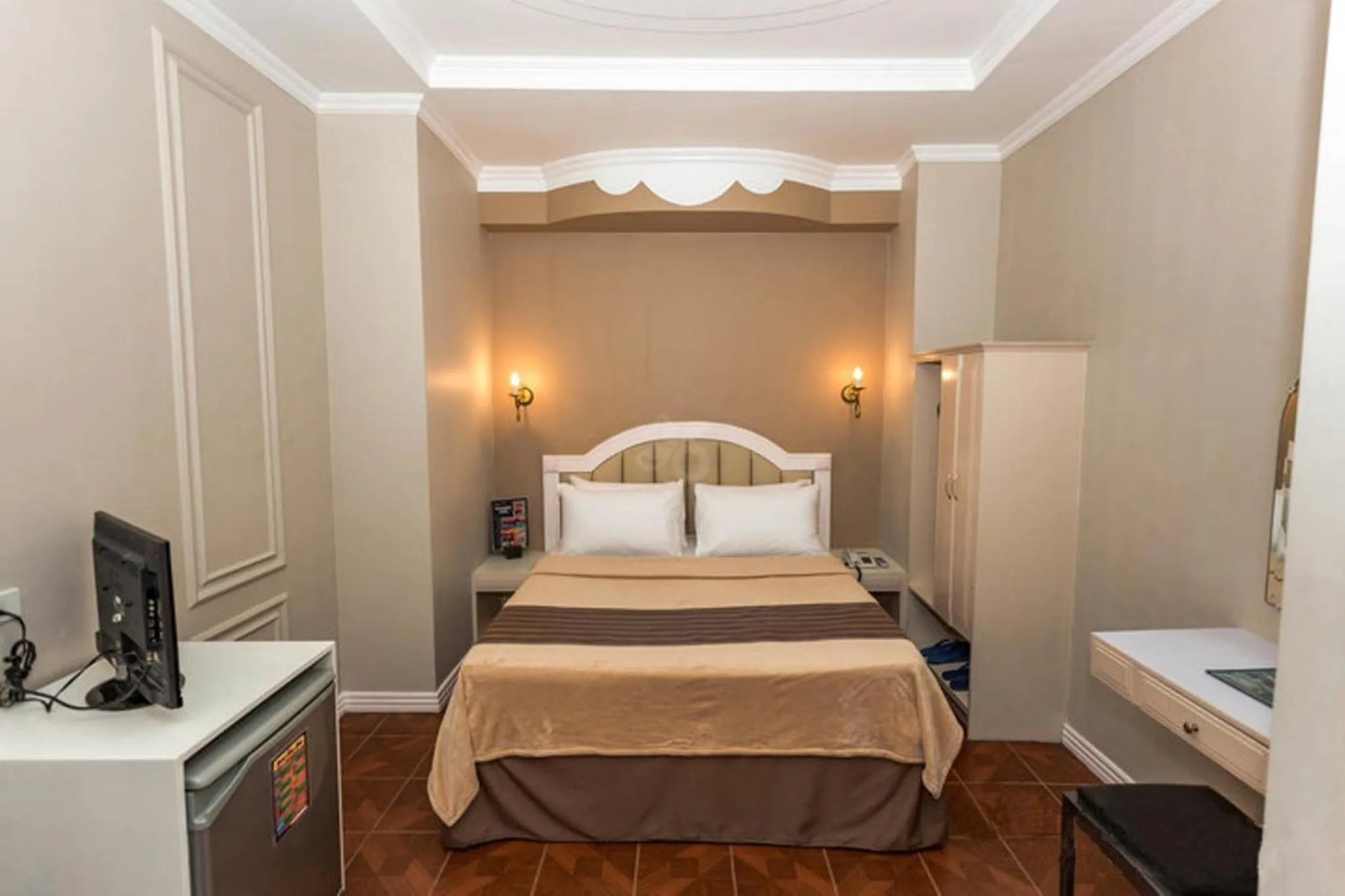 Bed in Urban Travellers Hotel