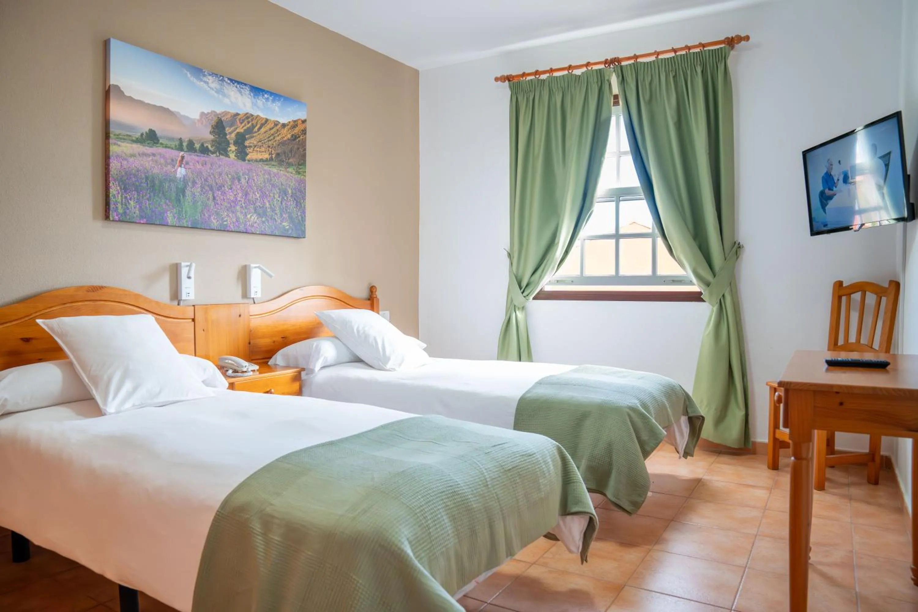 Bed in Apartamentos Oasis San Antonio