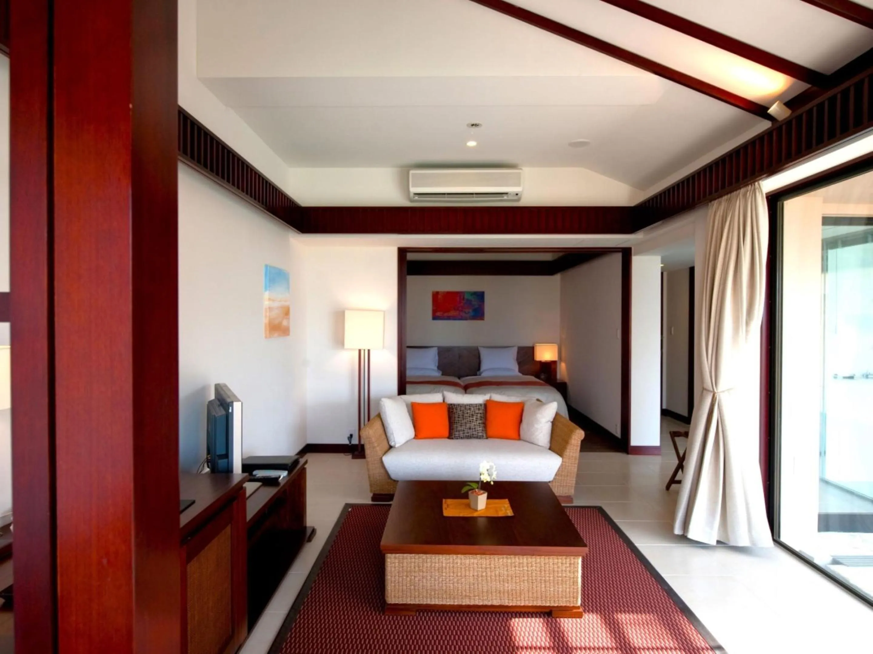 Living room, Bed in Shigira Bayside Suite Allamanda