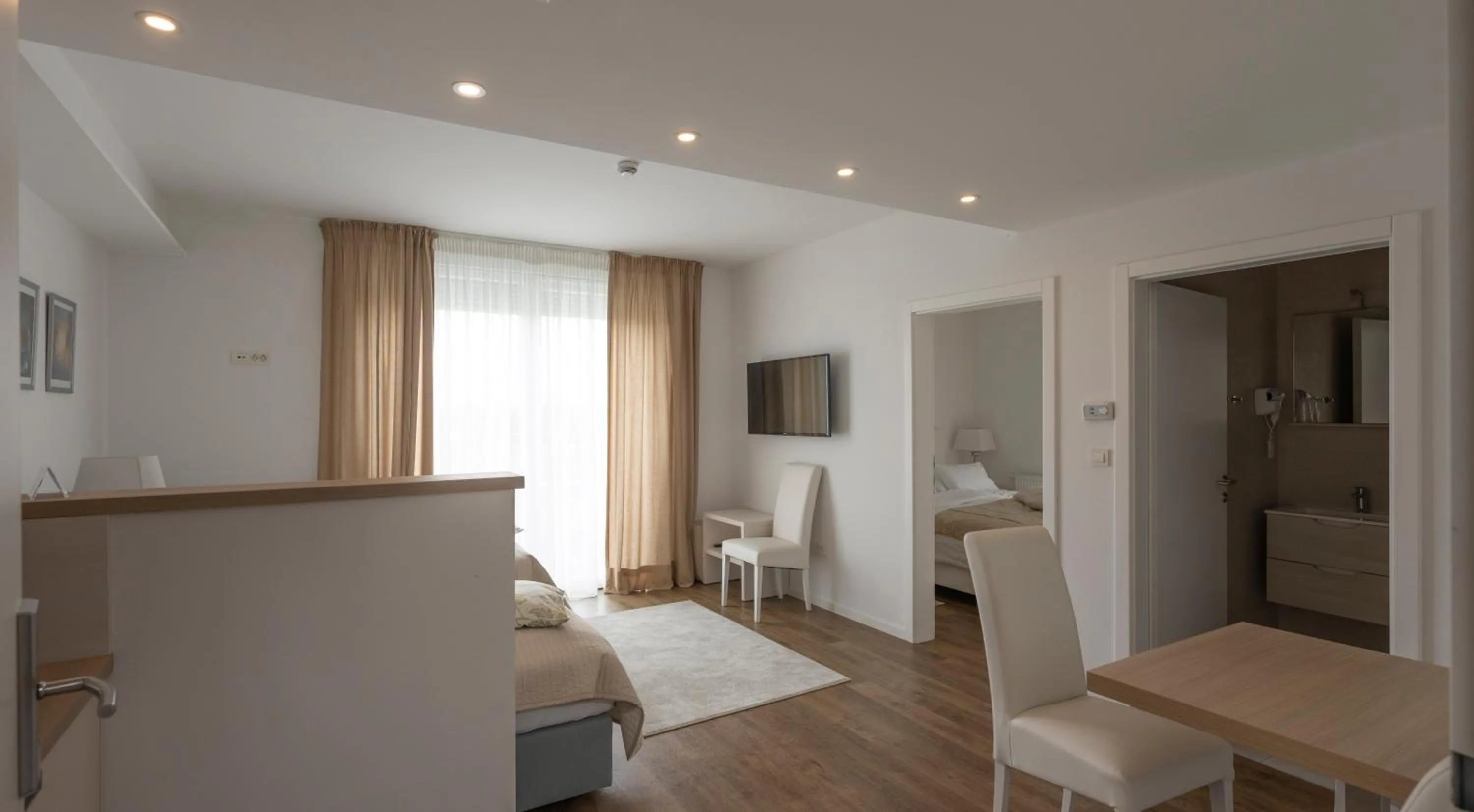 Living room, Bed in Hotel Magdalena