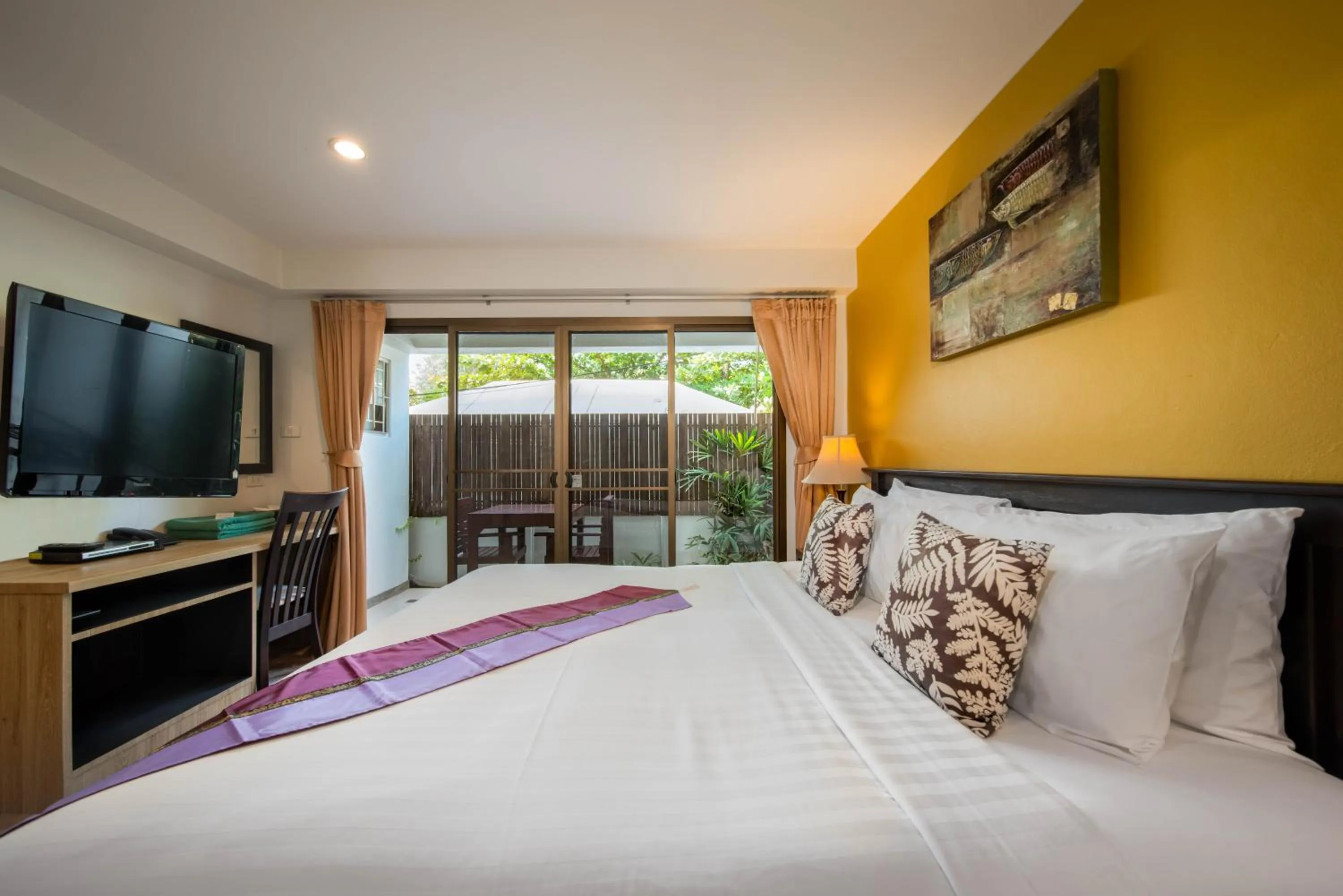 Bed in Kamala Beachfront Apartment