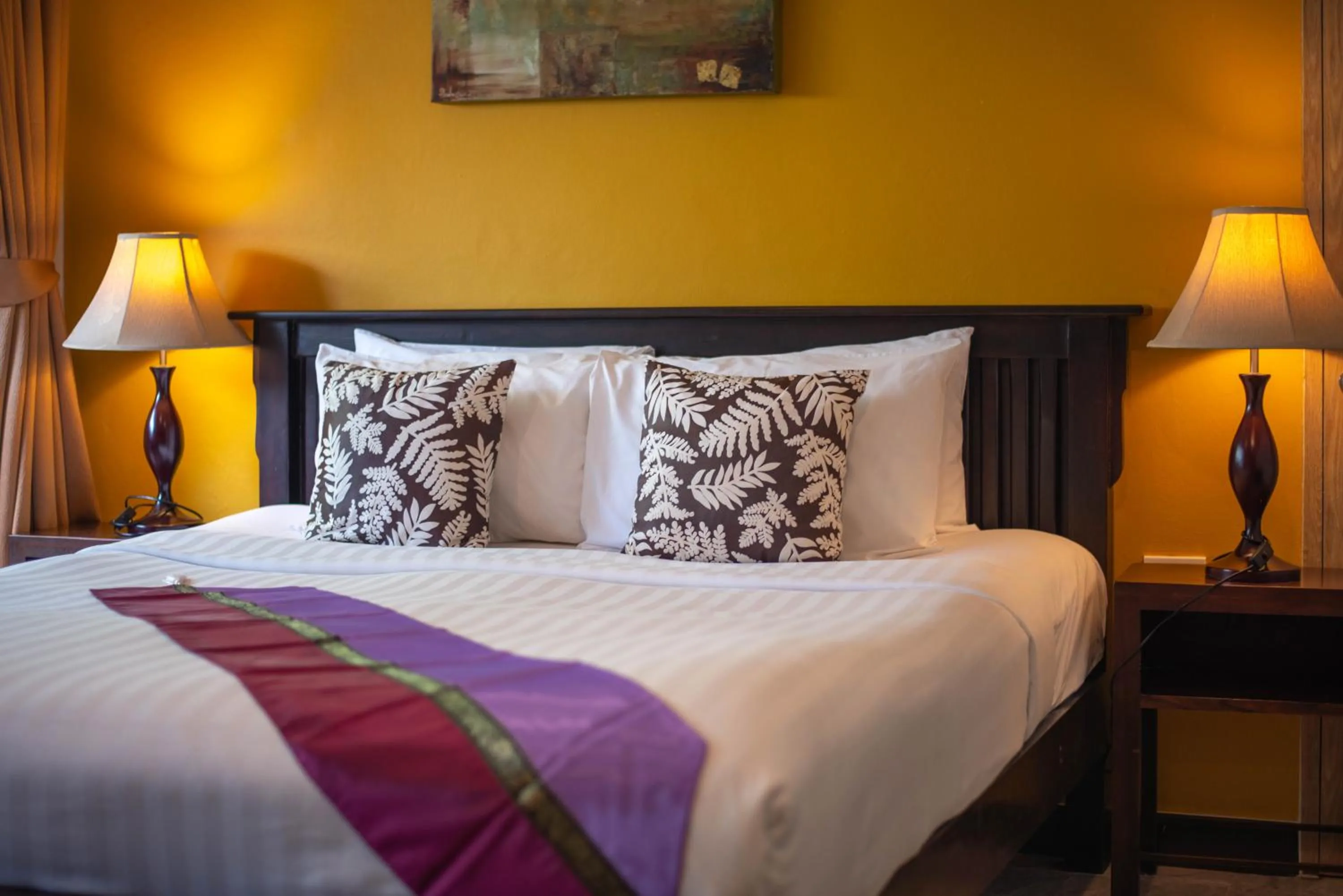 Bed in Kamala Beachfront Apartment