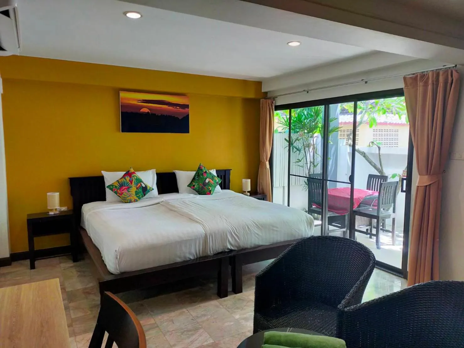 Bed in Kamala Beachfront Apartment