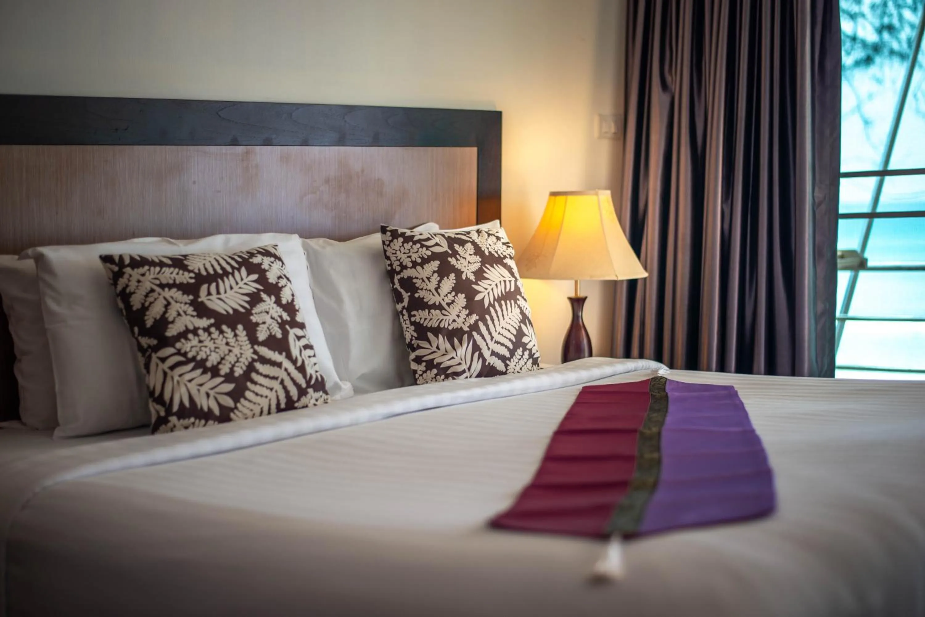 Bed in Kamala Beachfront Apartment