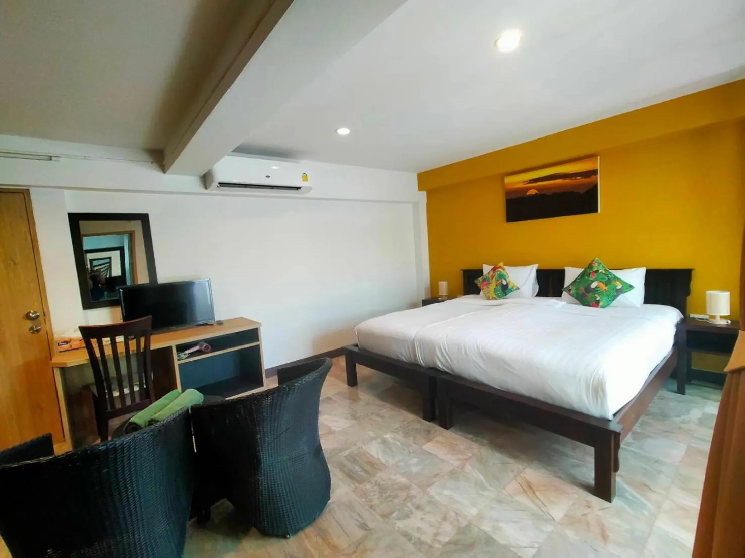 Bed in Kamala Beachfront Apartment