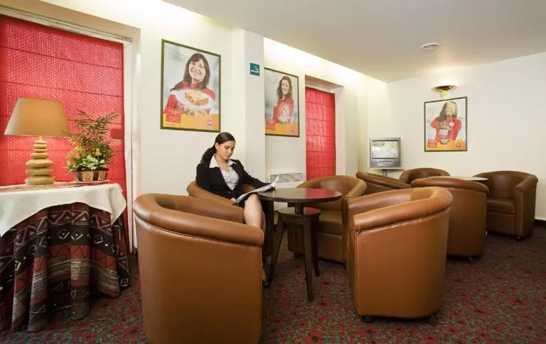 Lobby or reception in Hotel Mermoz Paris Le Bourget