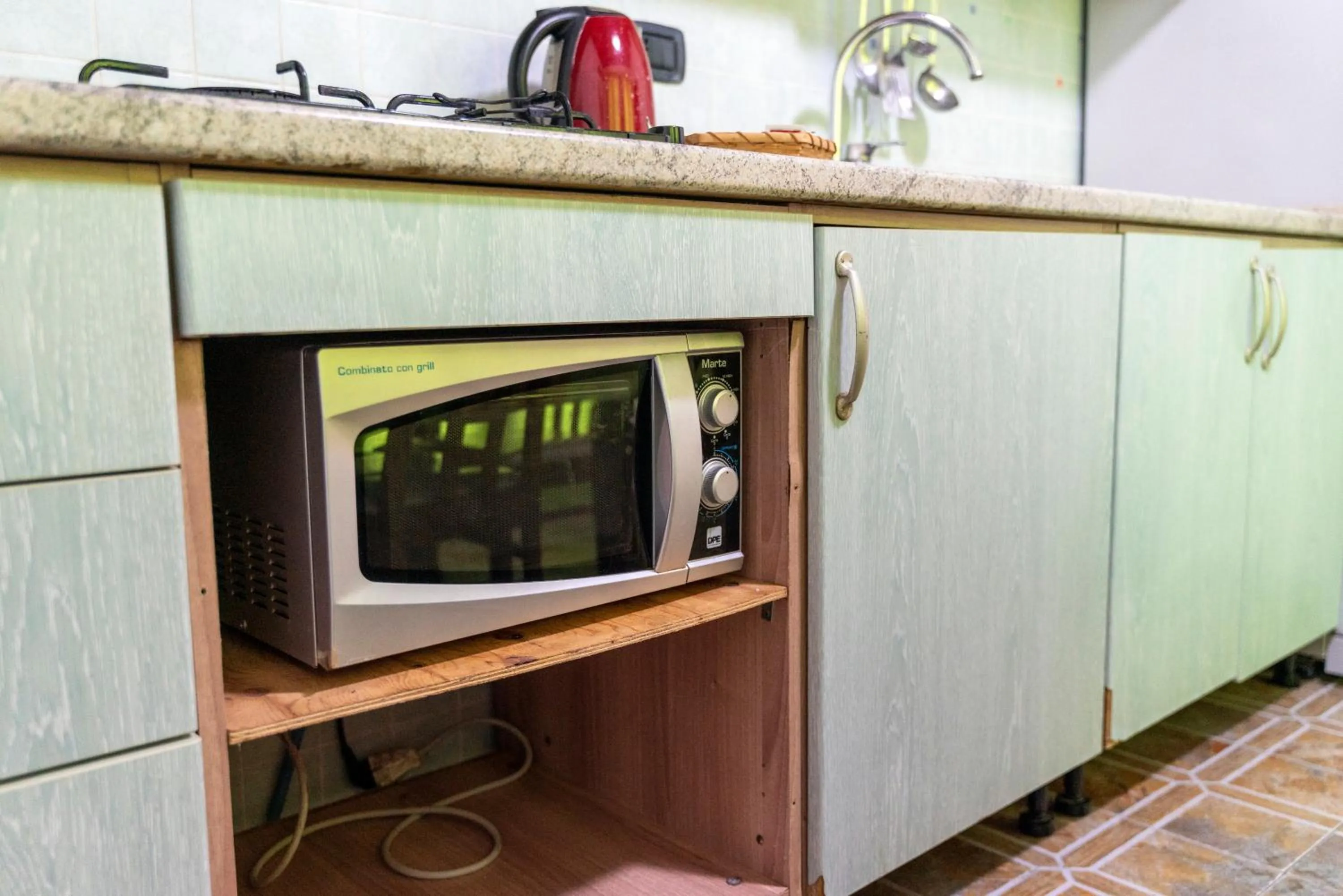 Kitchen or kitchenette in Residence Garibaldi