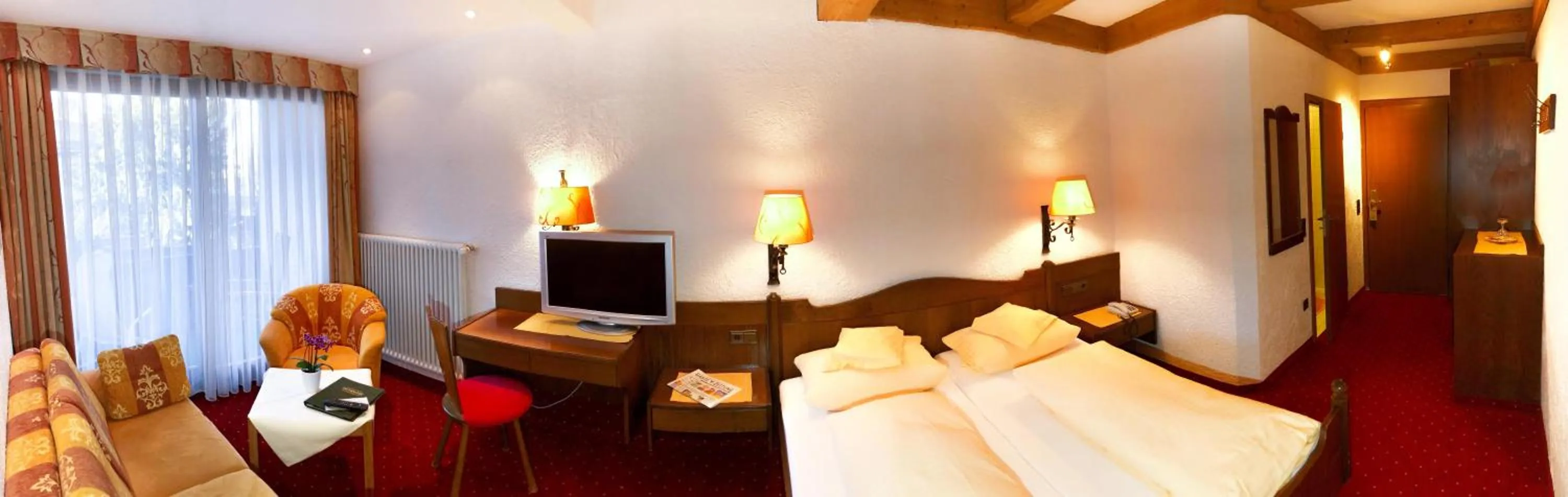 Photo of the whole room, Bed in Kurhotel Eichinger
