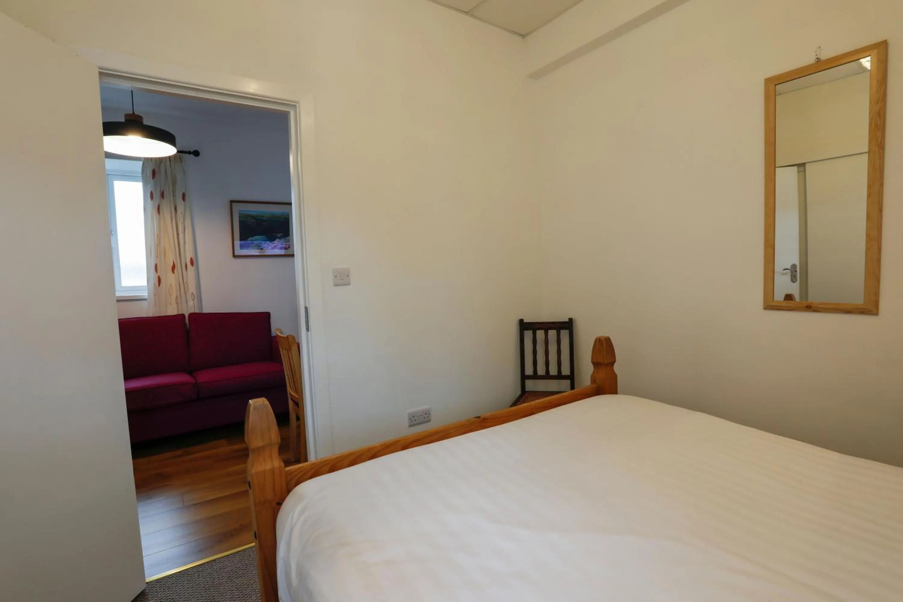 Bed in Atlantic Apartotel