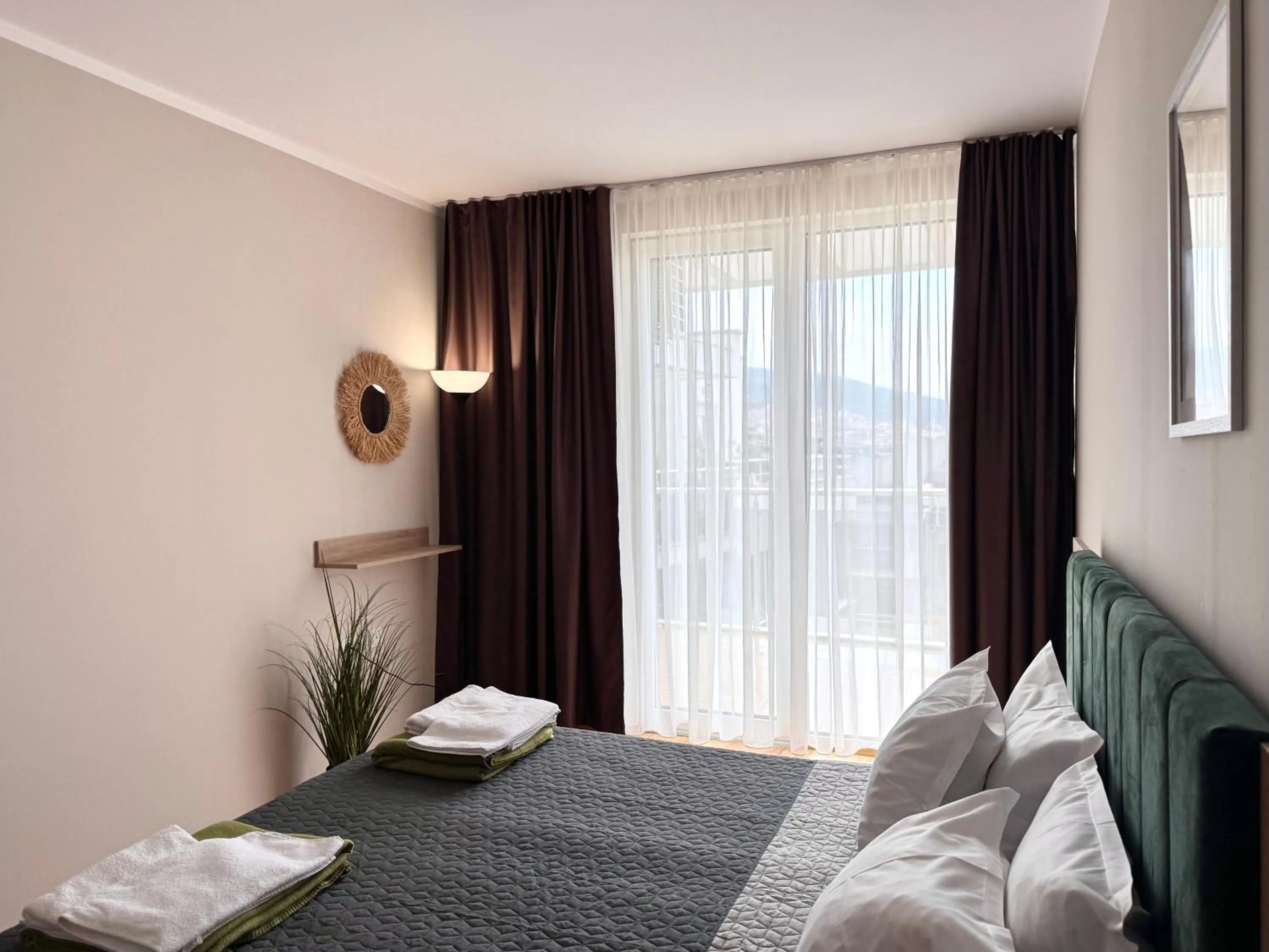 Bed in Sineva Del Sol Apartments