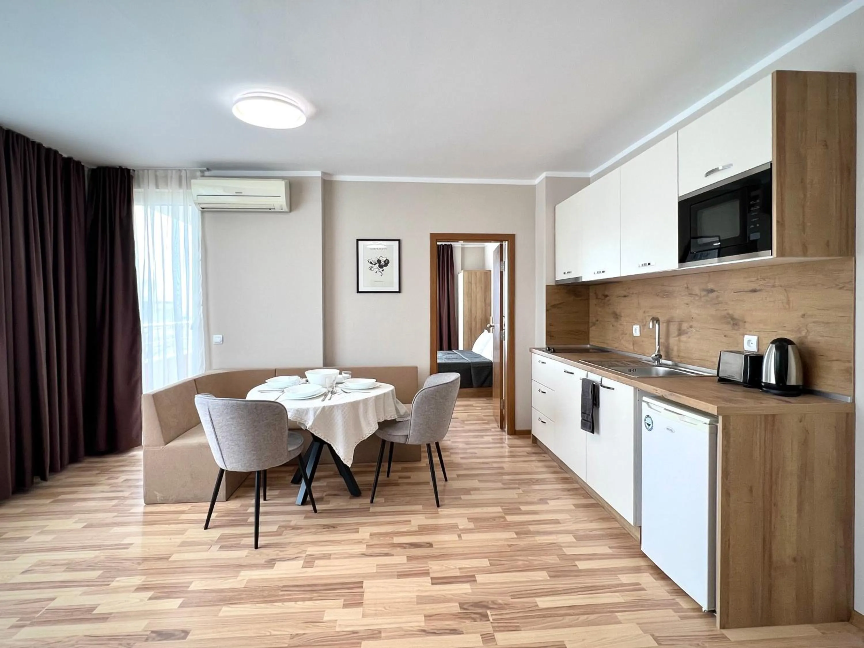Kitchen or kitchenette in Sineva Del Sol Apartments