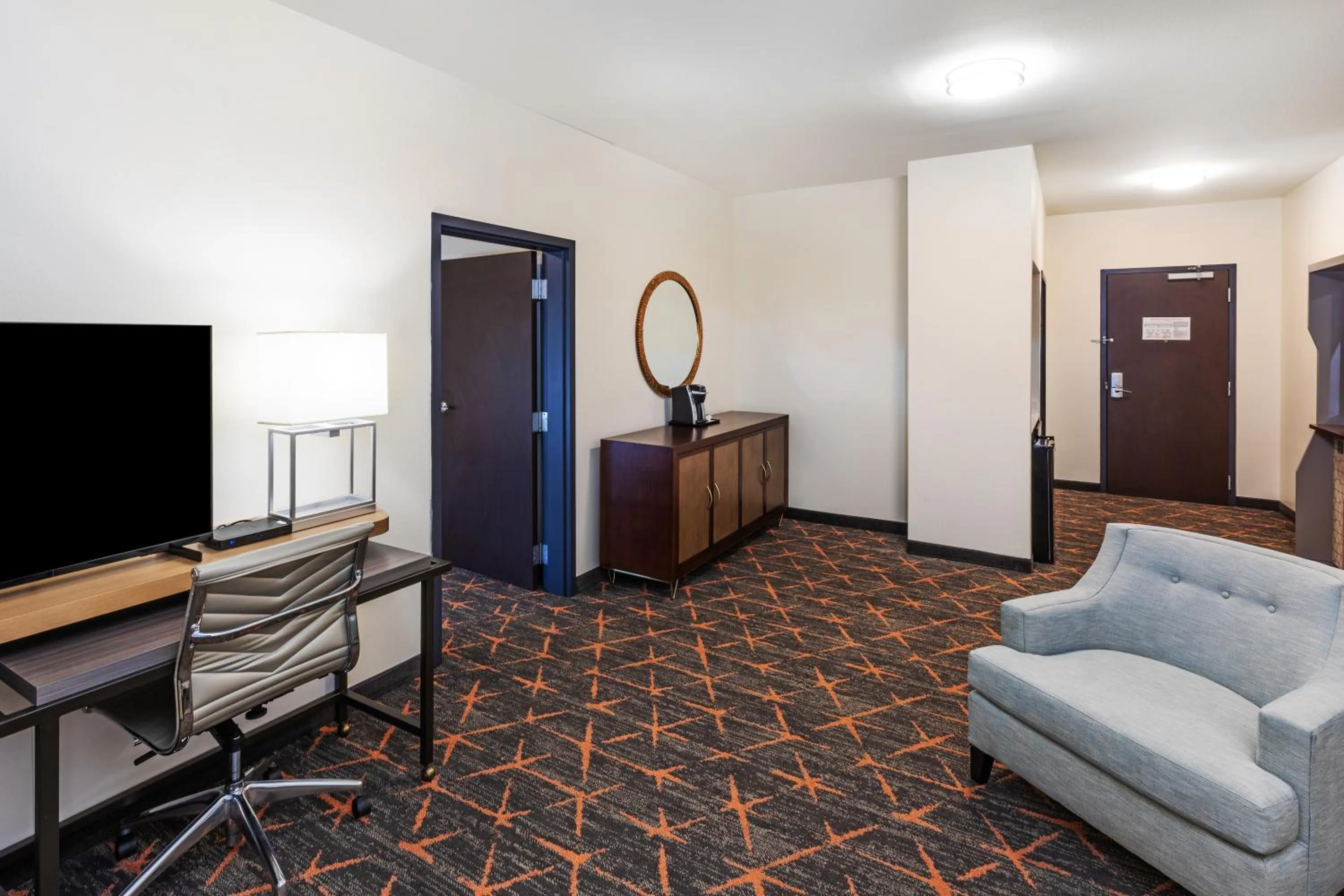 Seating area in Holiday Inn & Suites Stillwater-University West by IHG