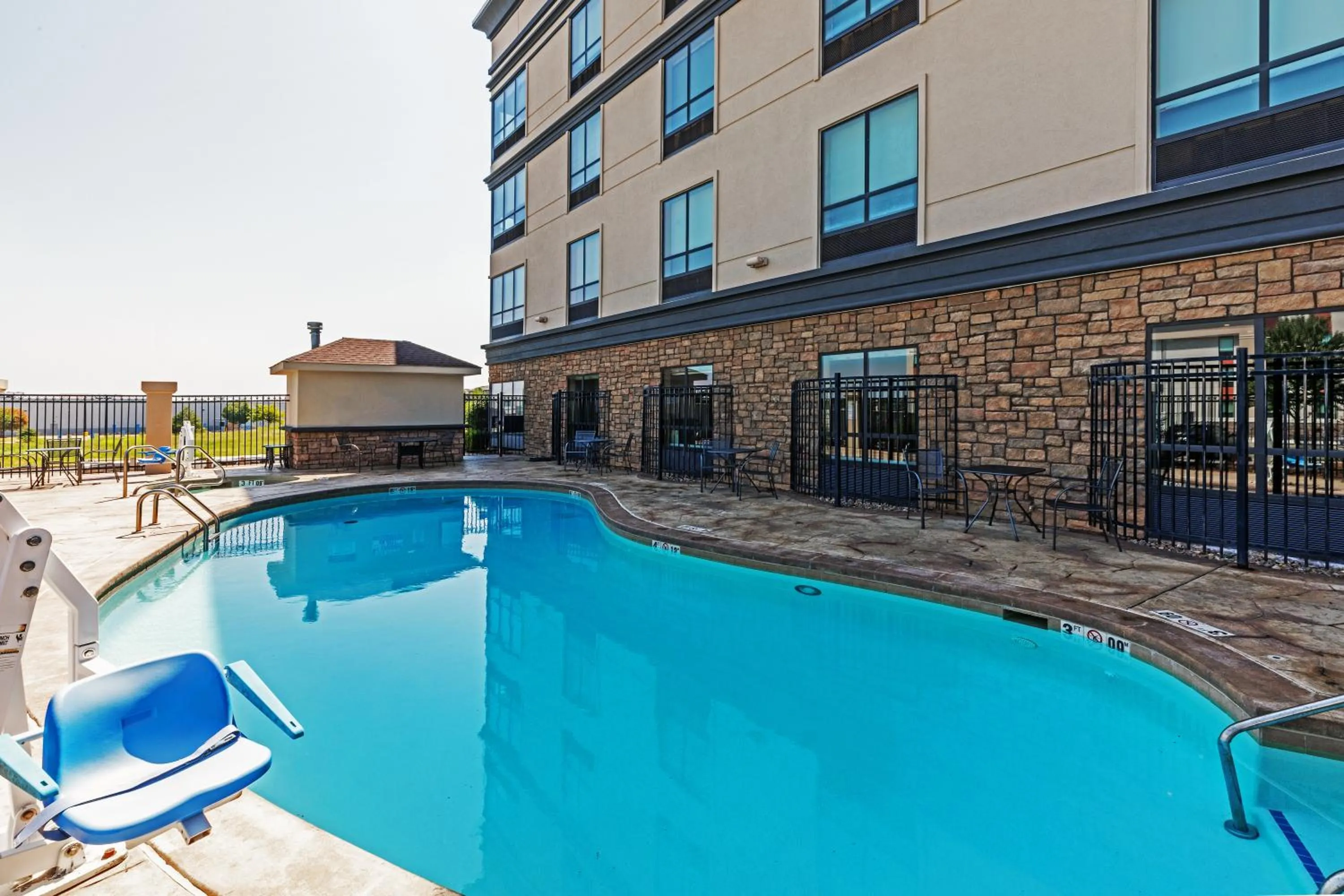 Swimming pool in Holiday Inn & Suites Stillwater-University West by IHG