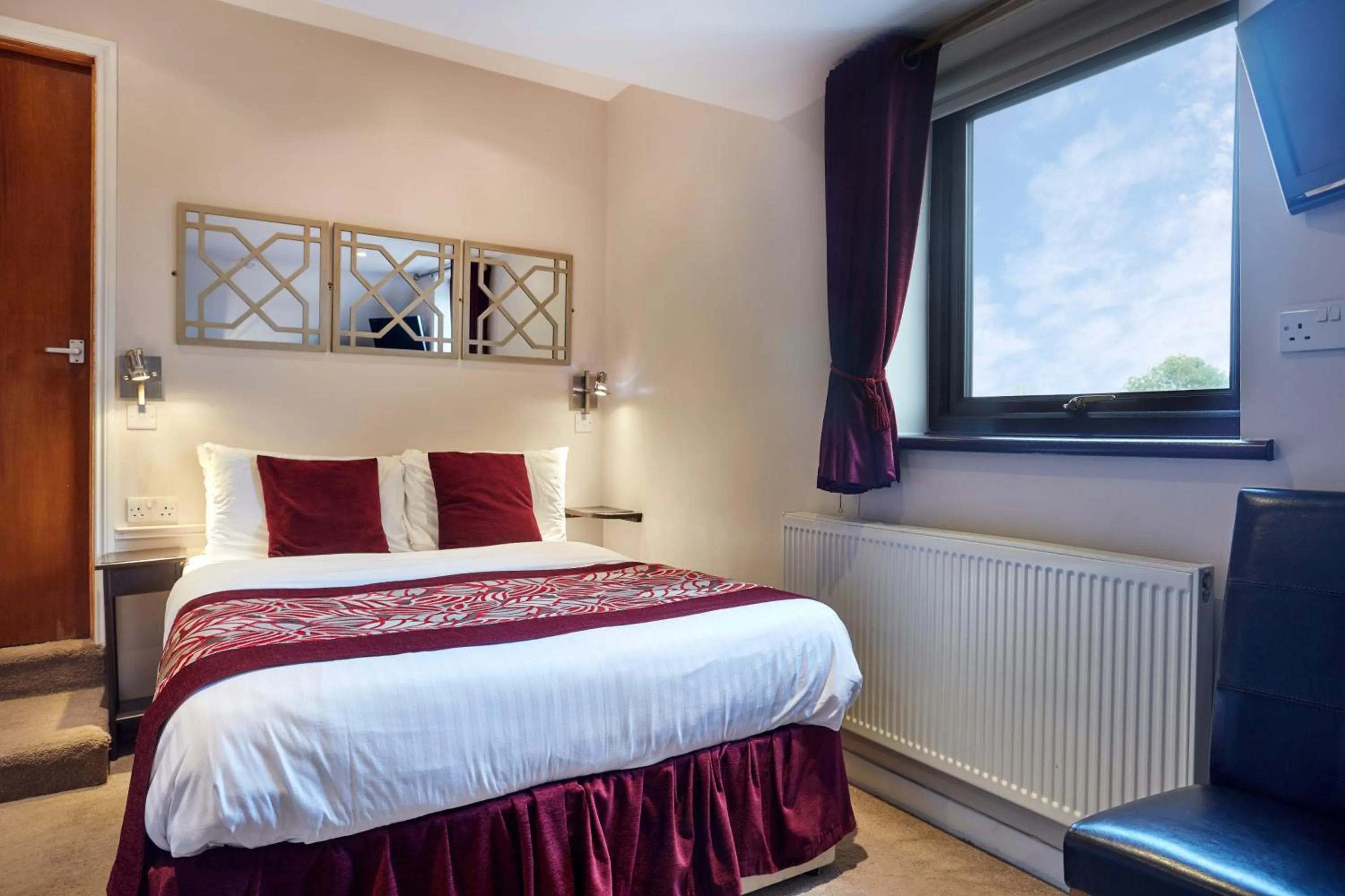 Bed in Conifers Guest House