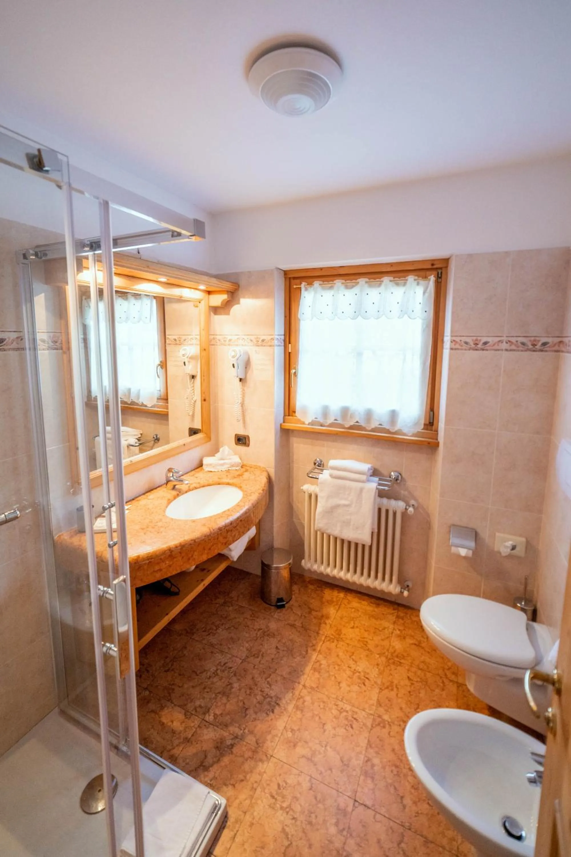 Bathroom in Alpi & Golf Hotel