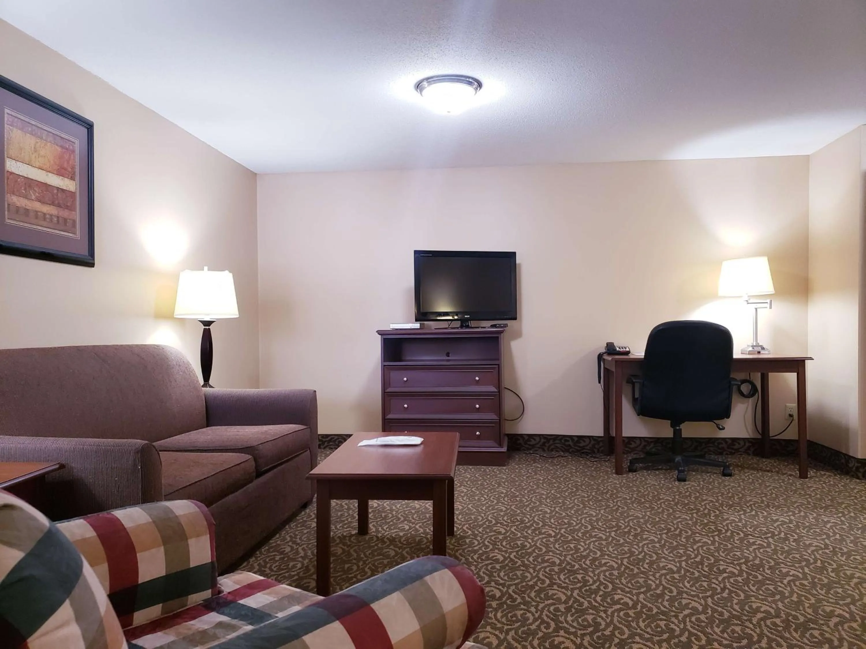 Photo of the whole room in SureStay Plus Hotel by Best Western Black River Falls
