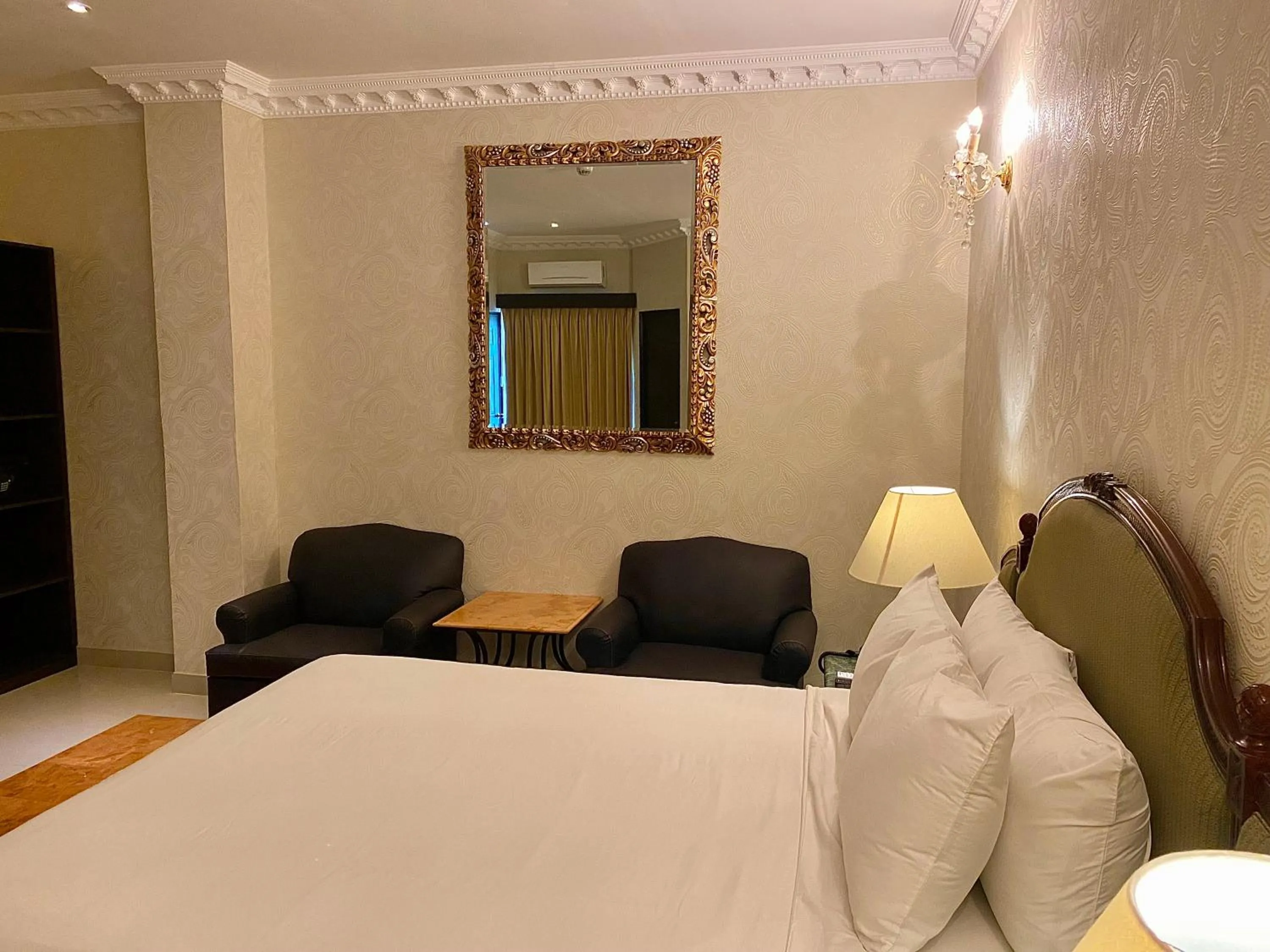 Bed in Hotel Palacio Maya