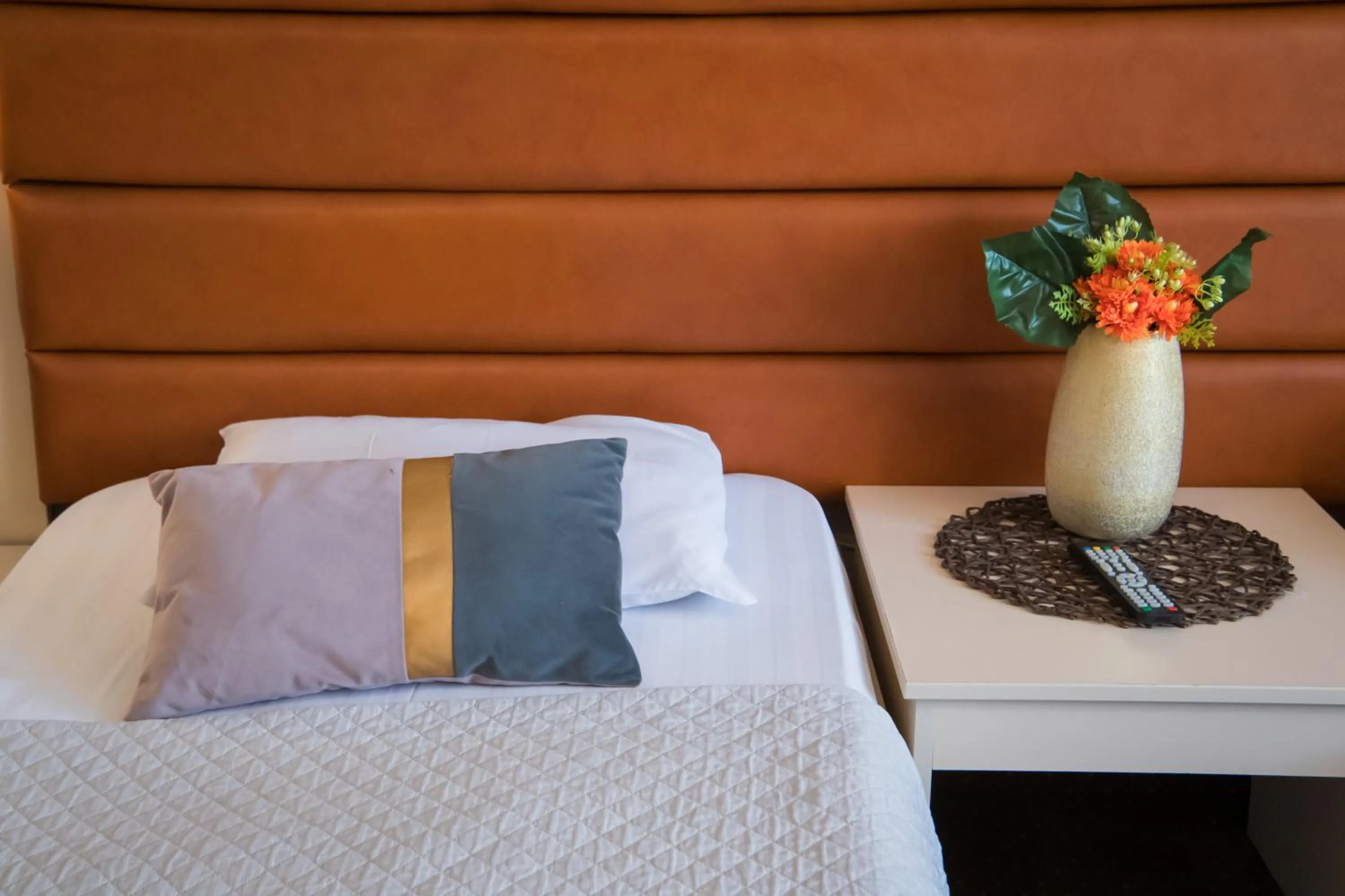 Bed in MBI Travel Inn