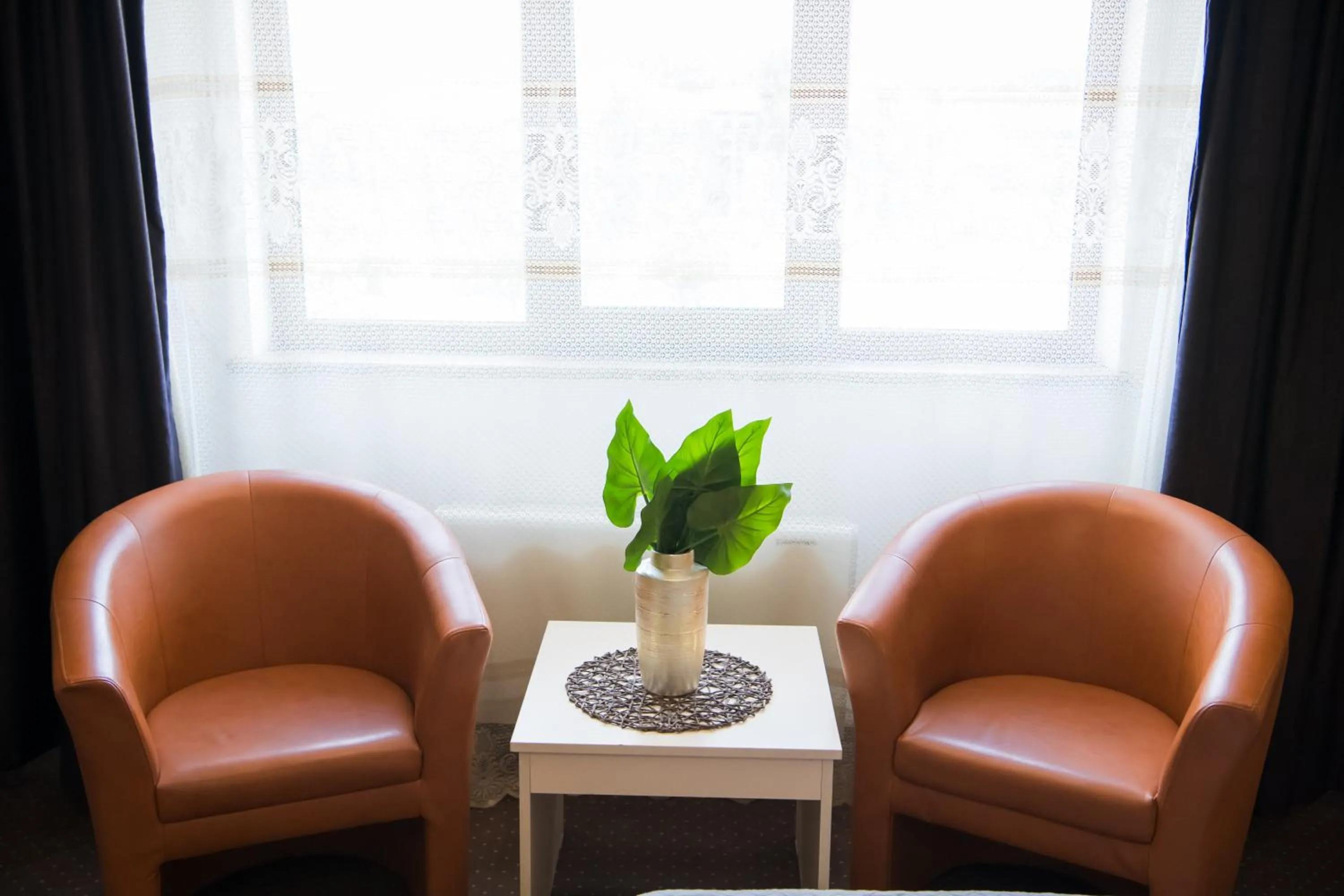Seating area in MBI Travel Inn
