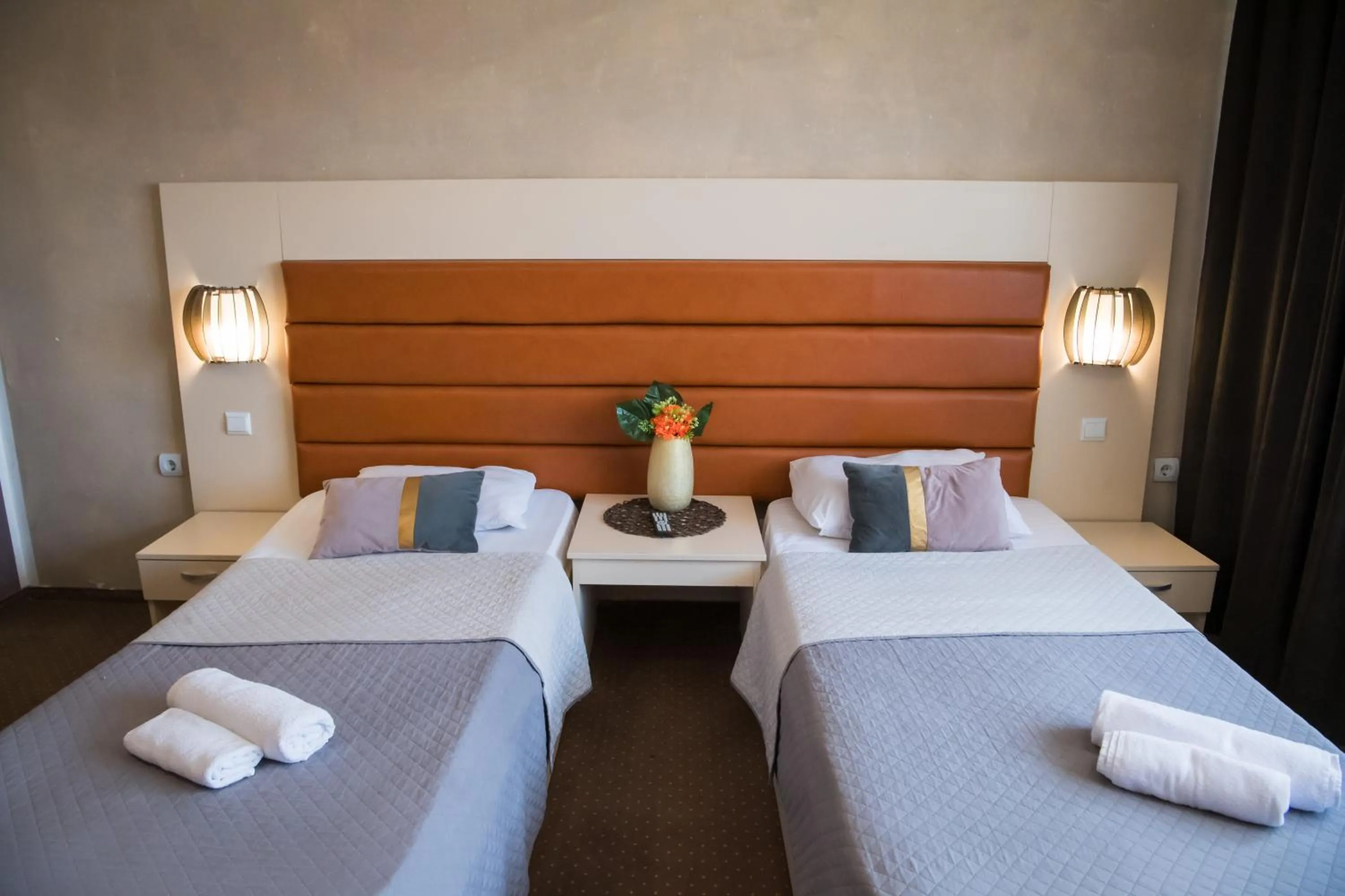 Bed in MBI Travel Inn