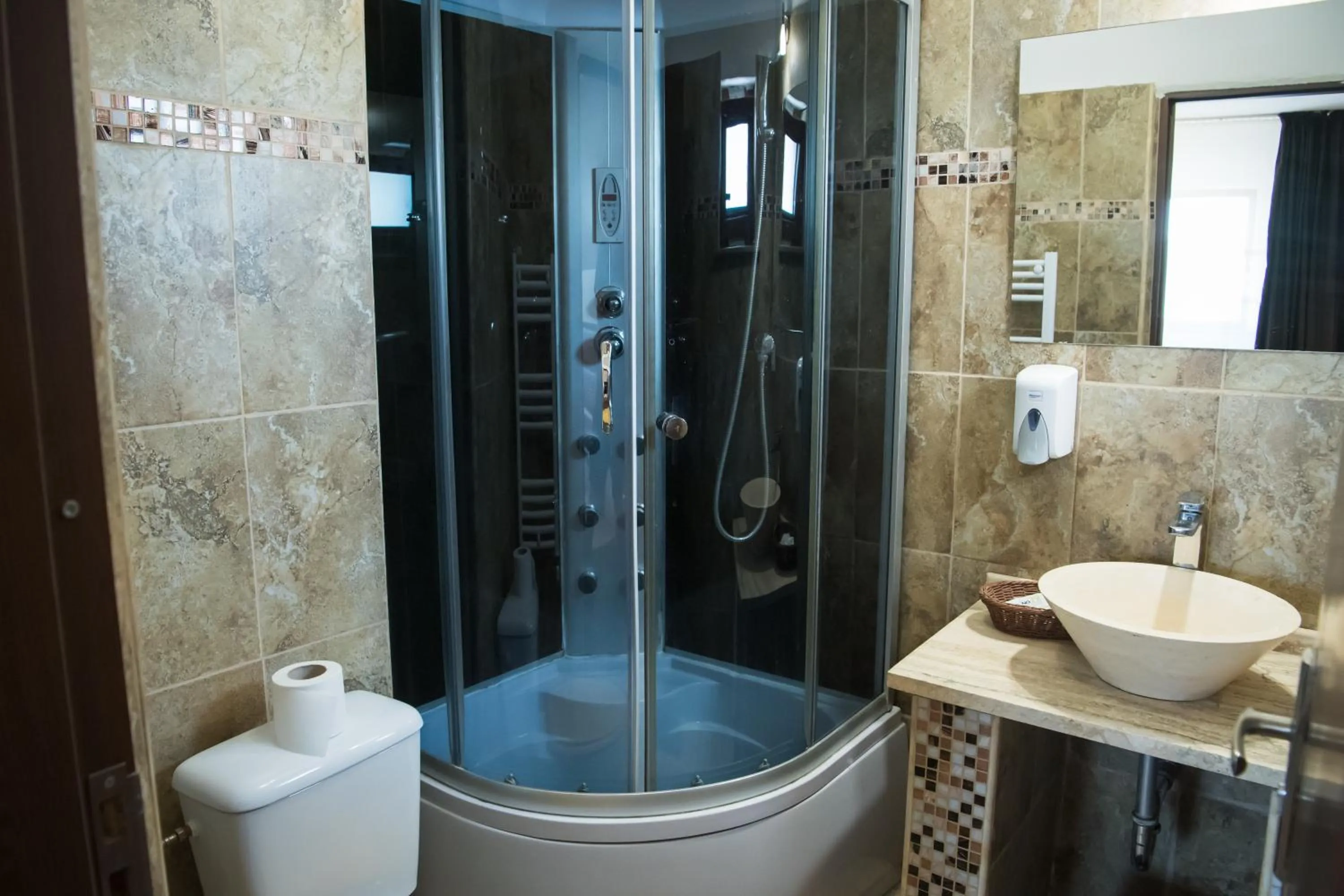 Shower in MBI Travel Inn