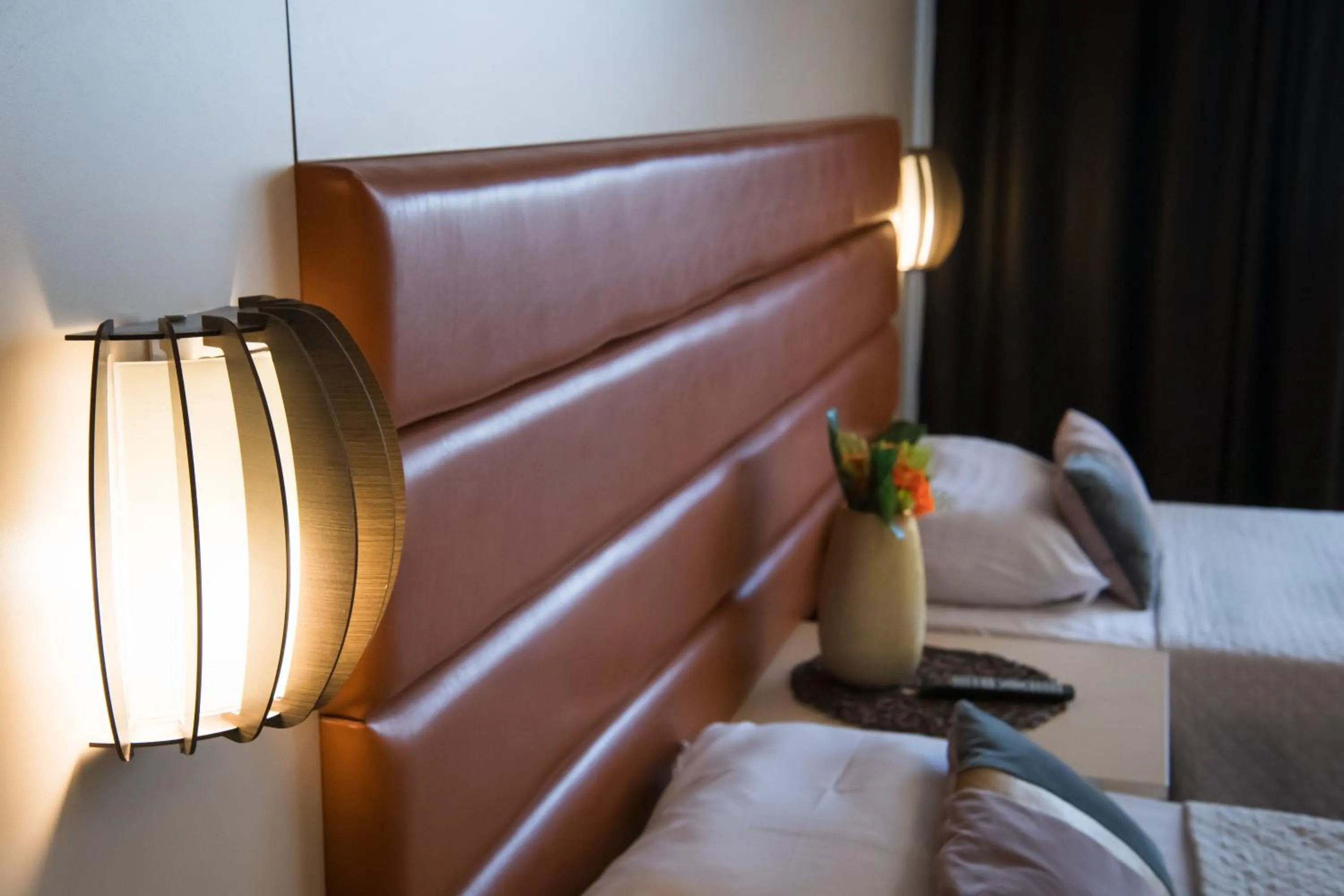 Bed in MBI Travel Inn