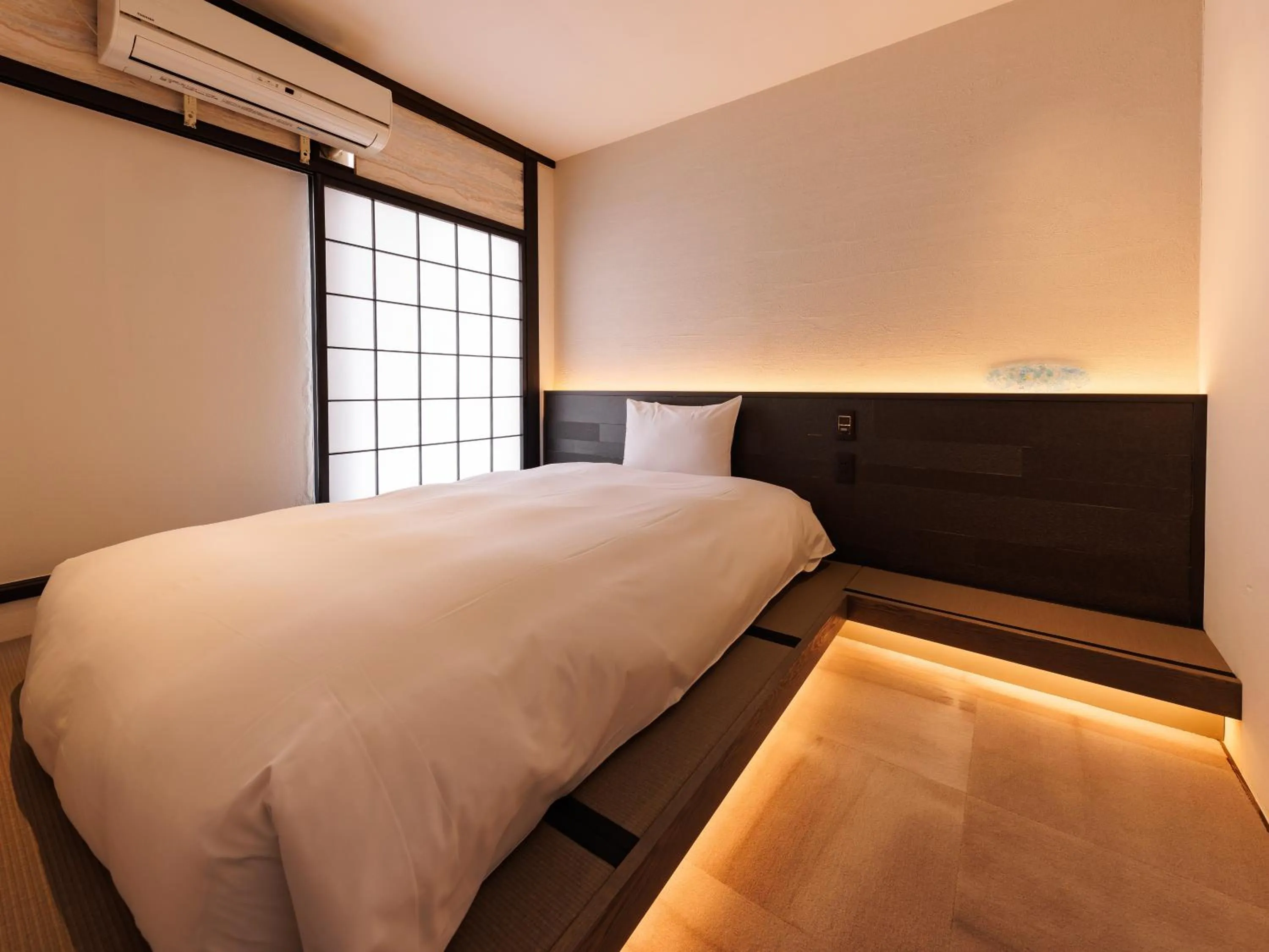 Bed in Kurofune Hotel