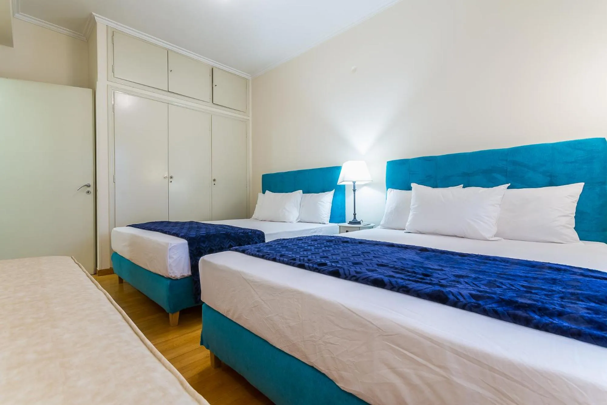 Bed in Victoria Queens Paradise Apartments