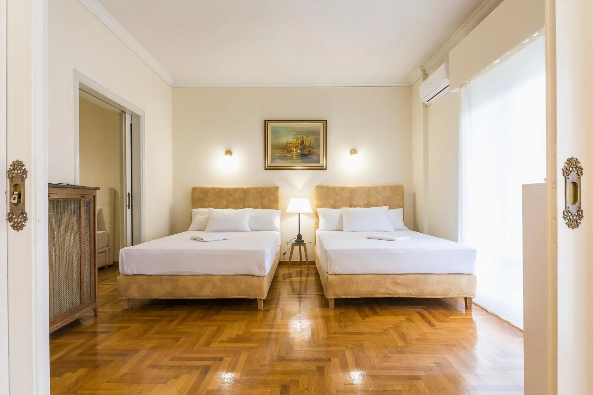 Bed in Victoria Queens Paradise Apartments