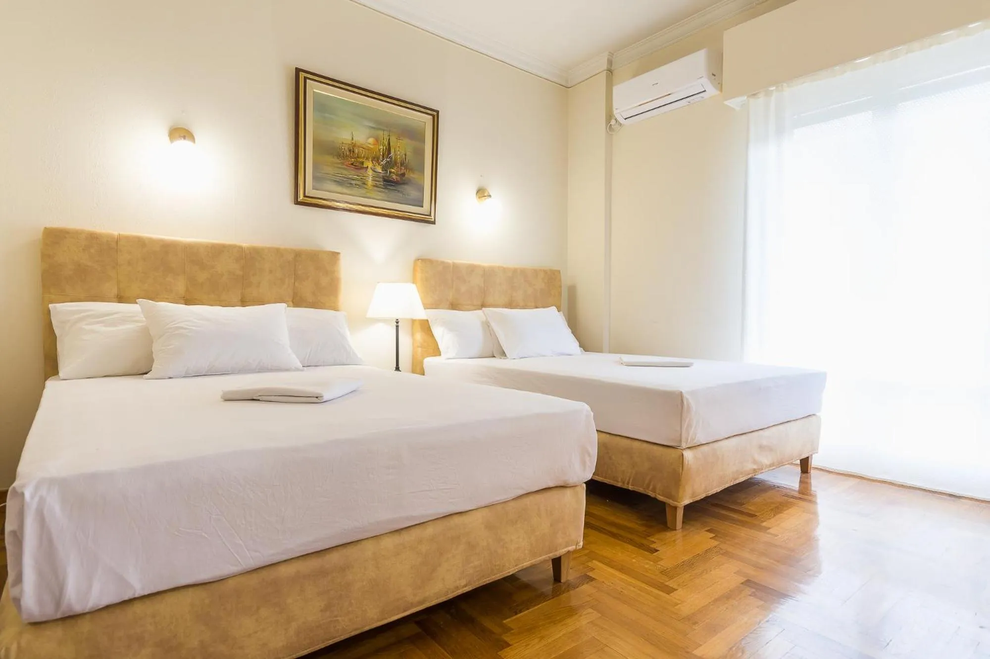 Bed in Victoria Queens Paradise Apartments