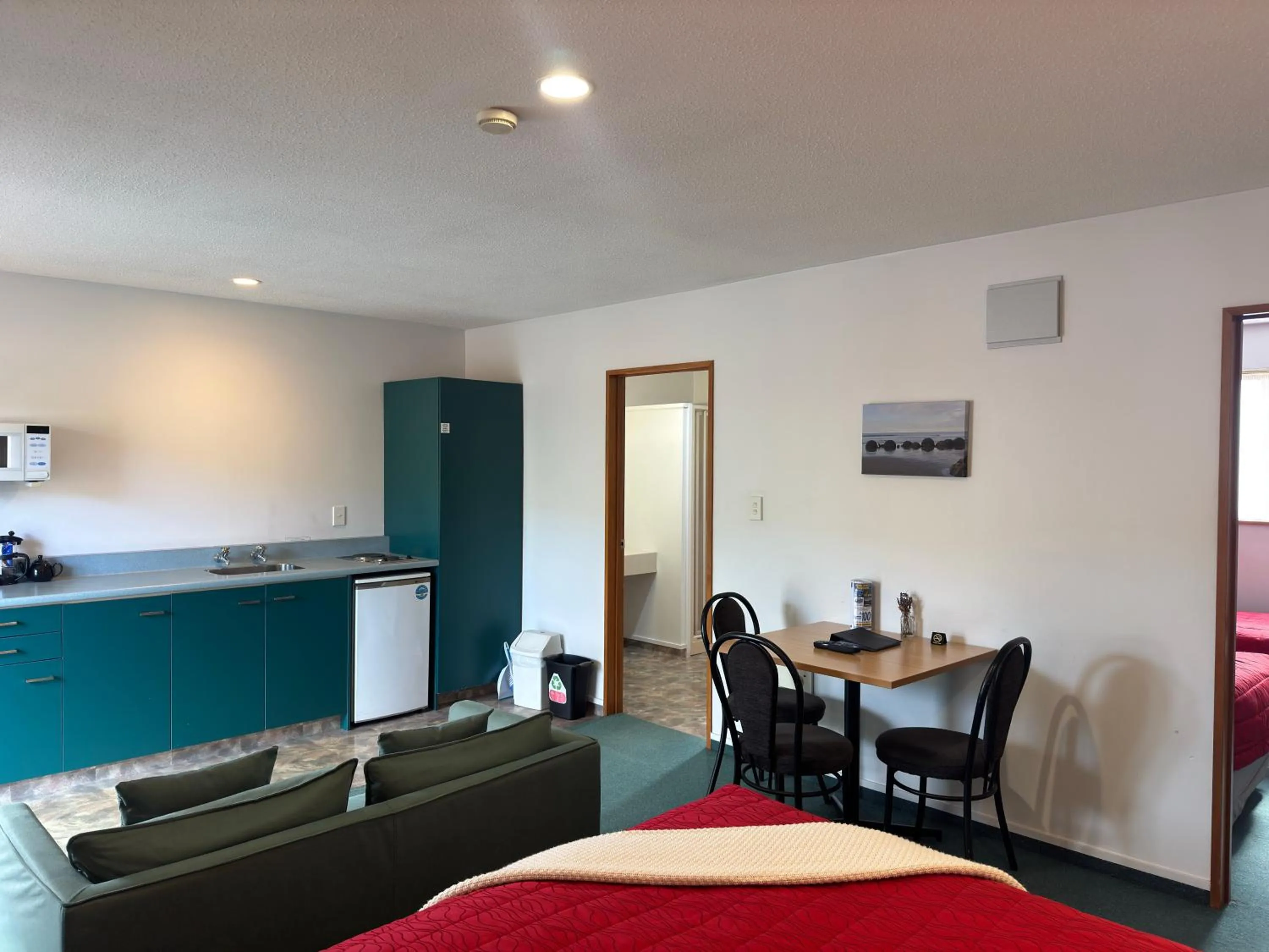 kitchen in ASURE Ambassador Motor Lodge