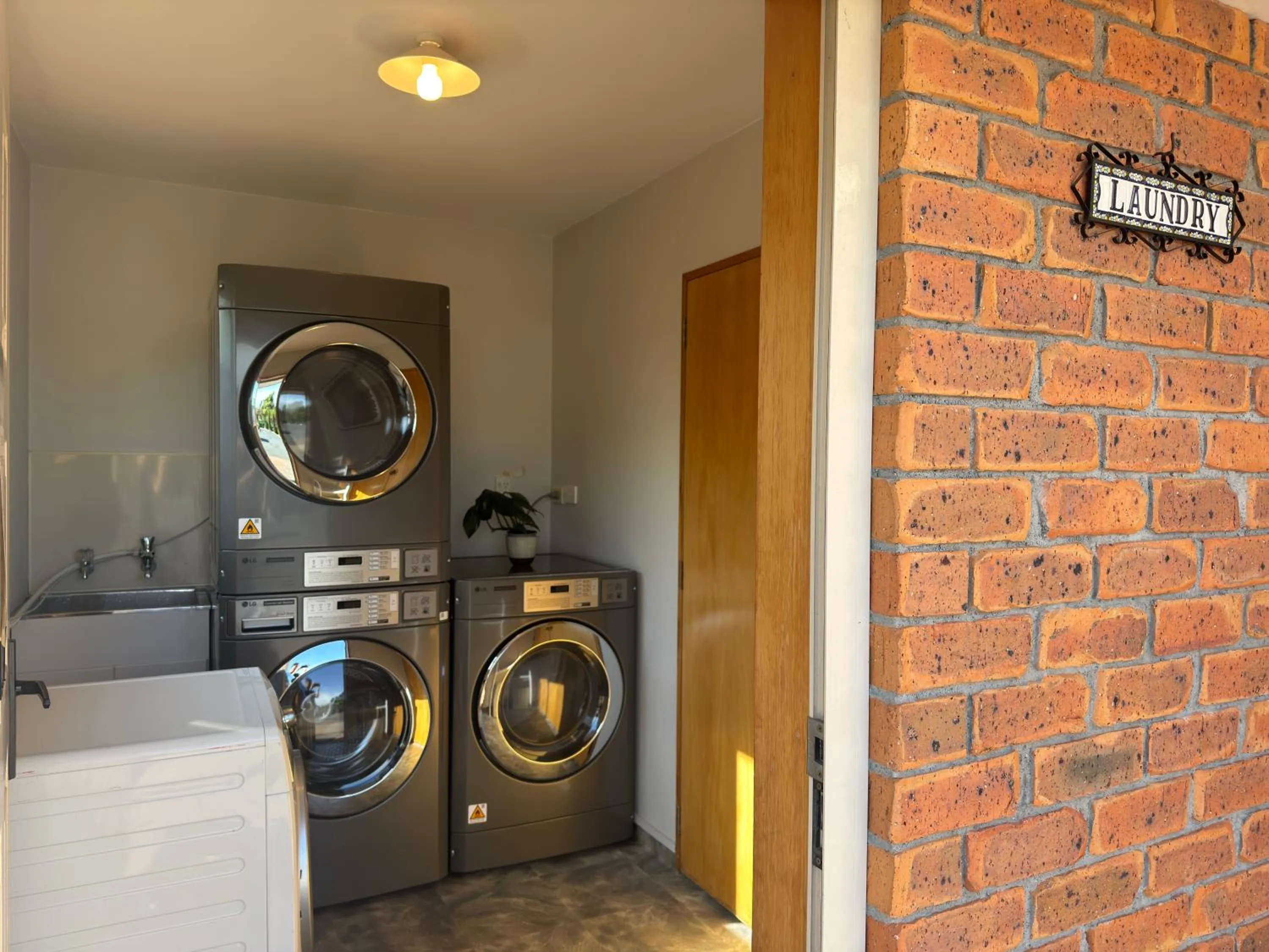 laundry in ASURE Ambassador Motor Lodge