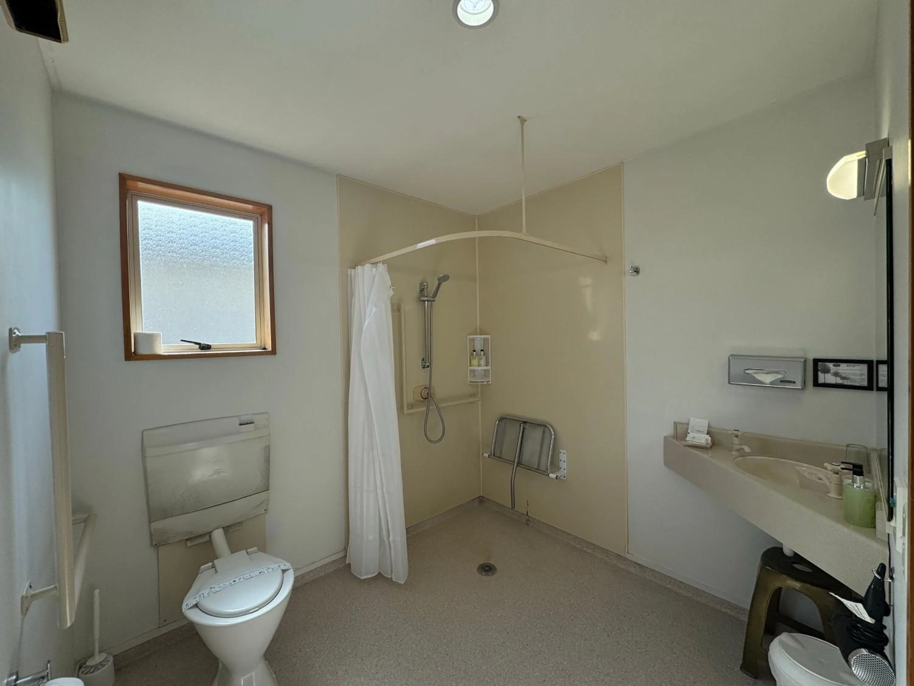 Bathroom in ASURE Ambassador Motor Lodge