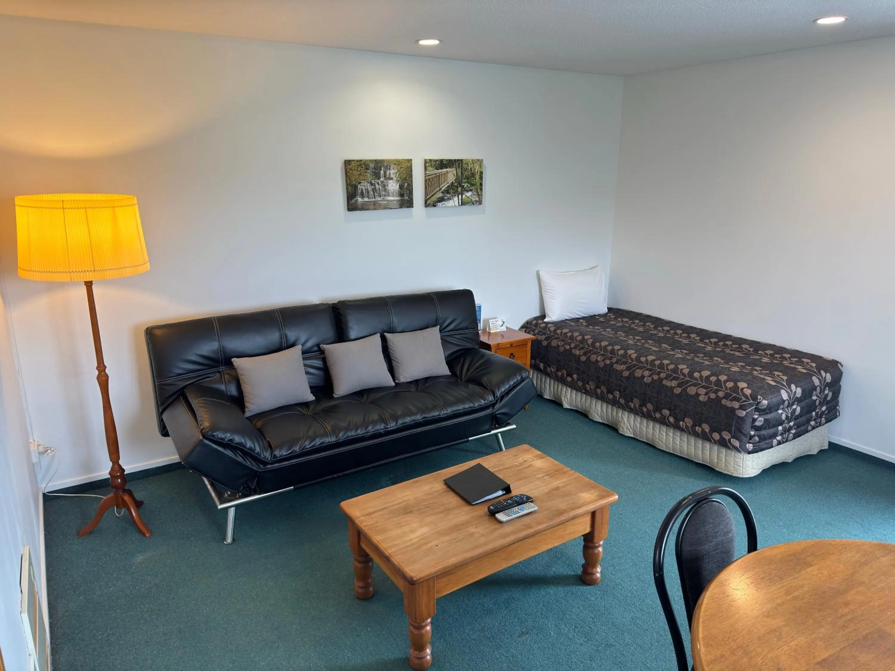 Living room in ASURE Ambassador Motor Lodge