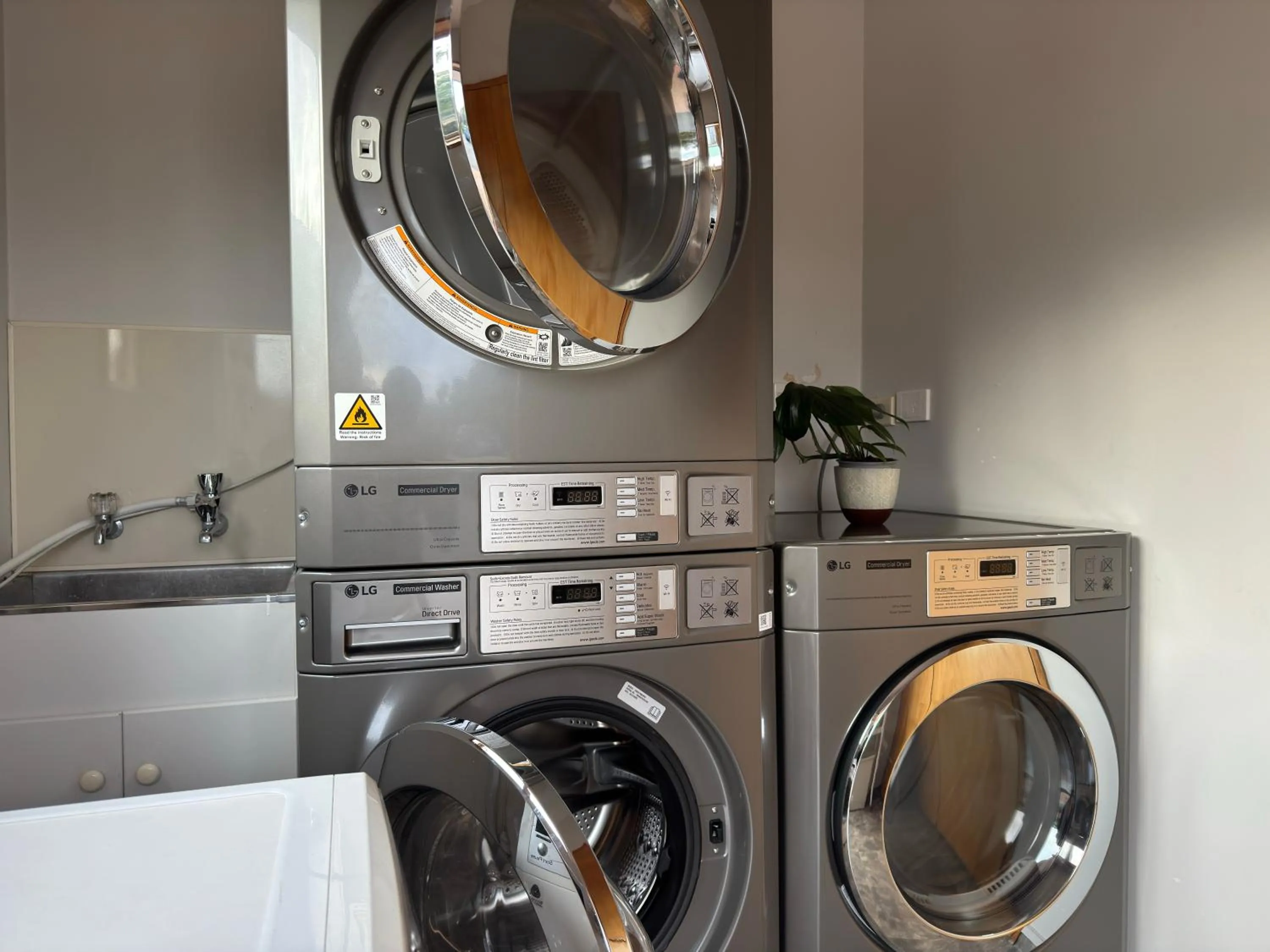 laundry in ASURE Ambassador Motor Lodge